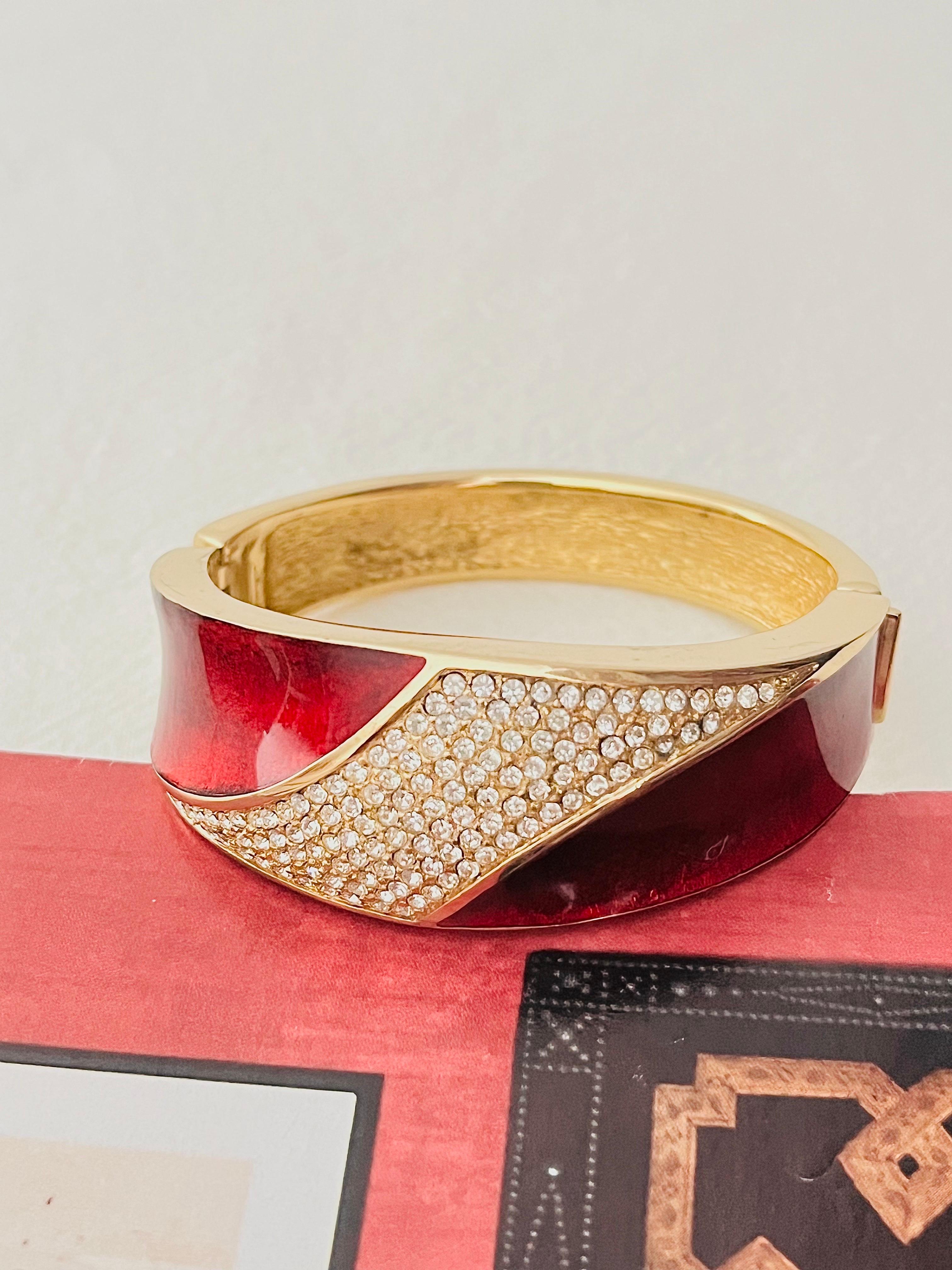 Christian Dior 1970s Vintage Unisex Bungundry Red Enamel Shining Whole Crystals Jumbo Chunky Statement Modernist Elegant Festive Manschette Cuff Bangle Bracelet, Gold Plated

Very excellent condition. Not any stones lost, all are sparkling. Only