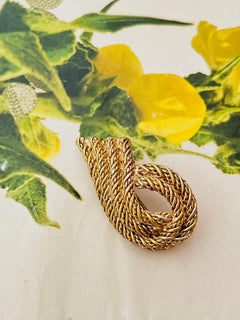 Christian Dior 1970s Vintage Textured Flame Wing Eye Rope Modernist Gold Brooch