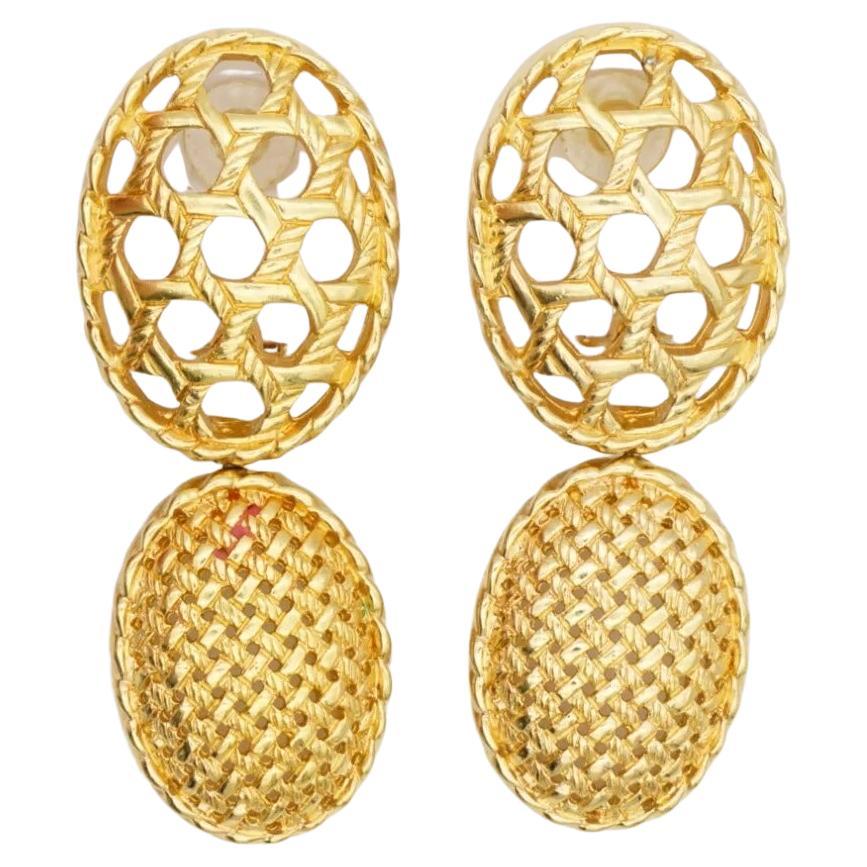 Christian Dior 1980 Vintage Large Double Oval Mesh Openwork Chunky Modernist Drop Clip Earrings, Gold Plated

Very excellent condition. Marked 'Chr.Dior (C) '. 100% Genuine.

It is around 50 years old. This is a very stylish and rare piece of