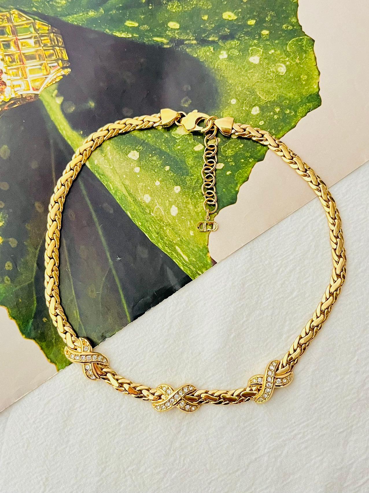 Christian Dior 1980s Vintage Unisex Trio Kiss Cross X Link Crystals Pendant Omega Necklace, Gold Plated

Very excellent condition. Very new. Rare to find.

Signed at clasp. 100% Genuine. 

Size: 40*0.6 cm. Extend chain: 6 cm. Each pendant: 2.0*1.1