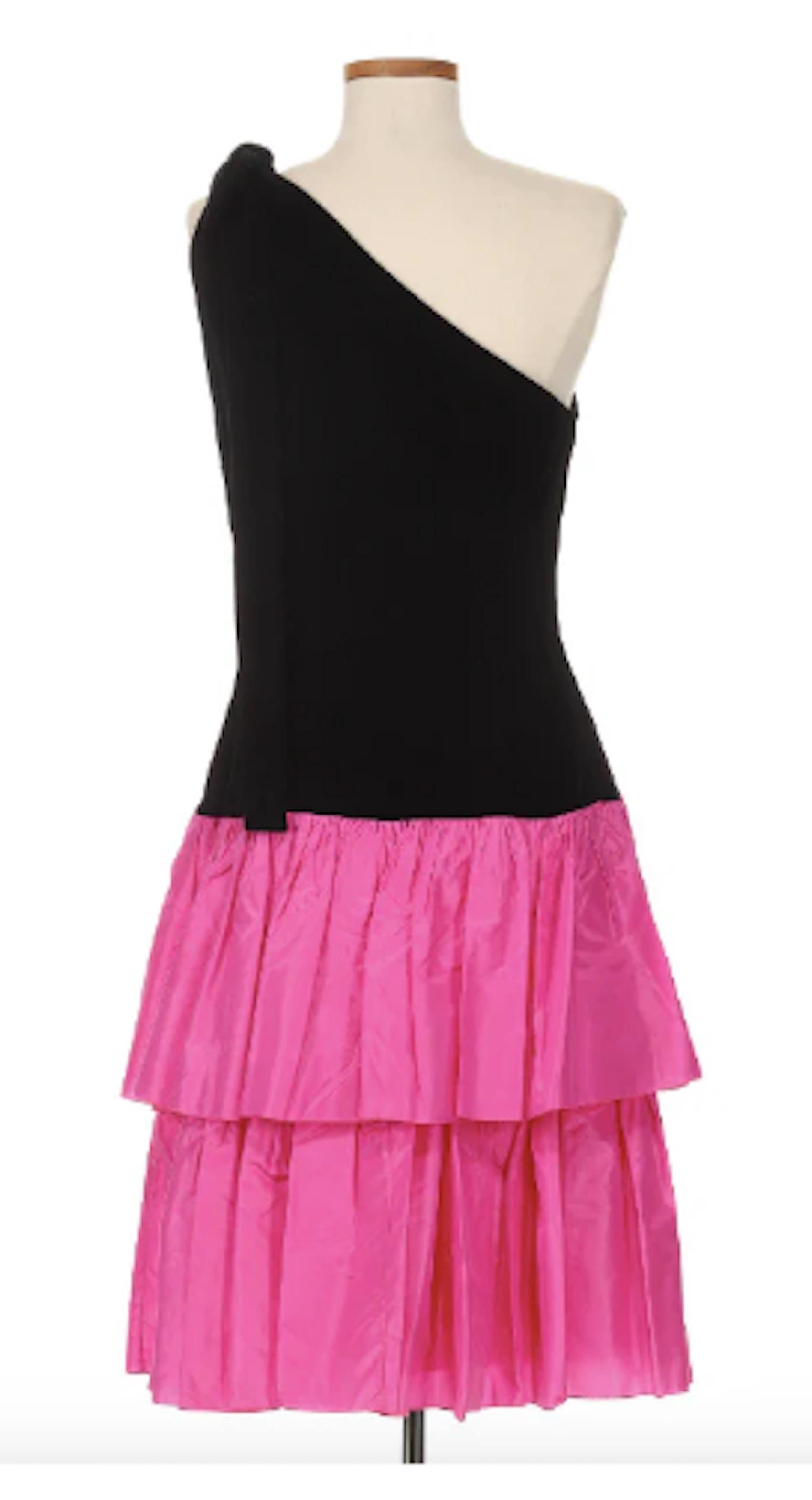 VINTAGE GRACE NY

Christian Dior 1980's Black Velvet Dress with Pink Bottom. This dress is a step back into the 80s through its perfectly nostolgic design. Combined with the richness & elegance of black velvet with a pop of vibrant pink, this dress