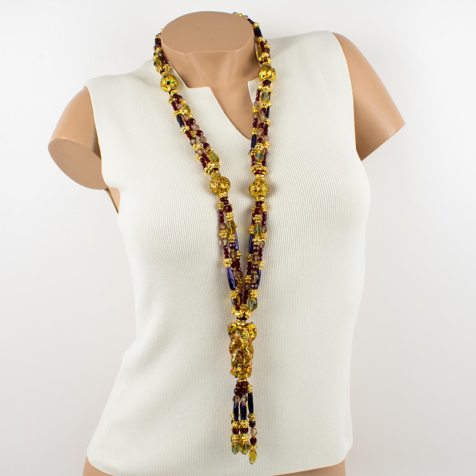 This spectacular one-of-a-kind Christian Dior runway couture necklace boasts an extra-long multi-strand shape with a dangling tassel. The piece is built with hand-blown Murano art-glass beads and complemented with gilt metal carved spacers. This