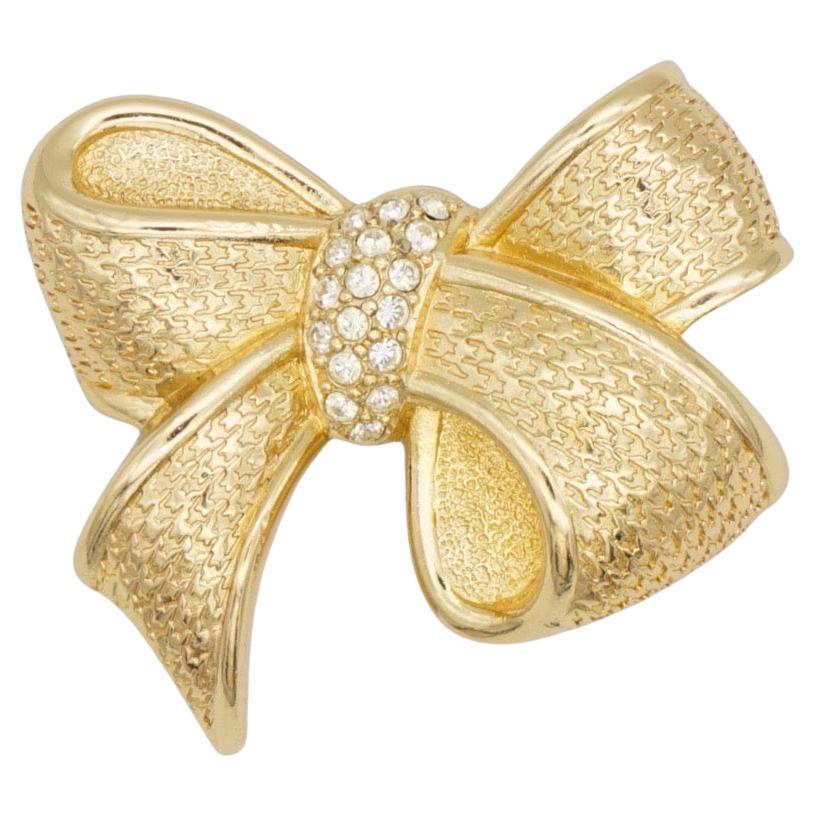 Christian Dior 1980er Jahre Vintage Kristalle Knoten Schleife Schmetterling Elegante Brosche im Angebot