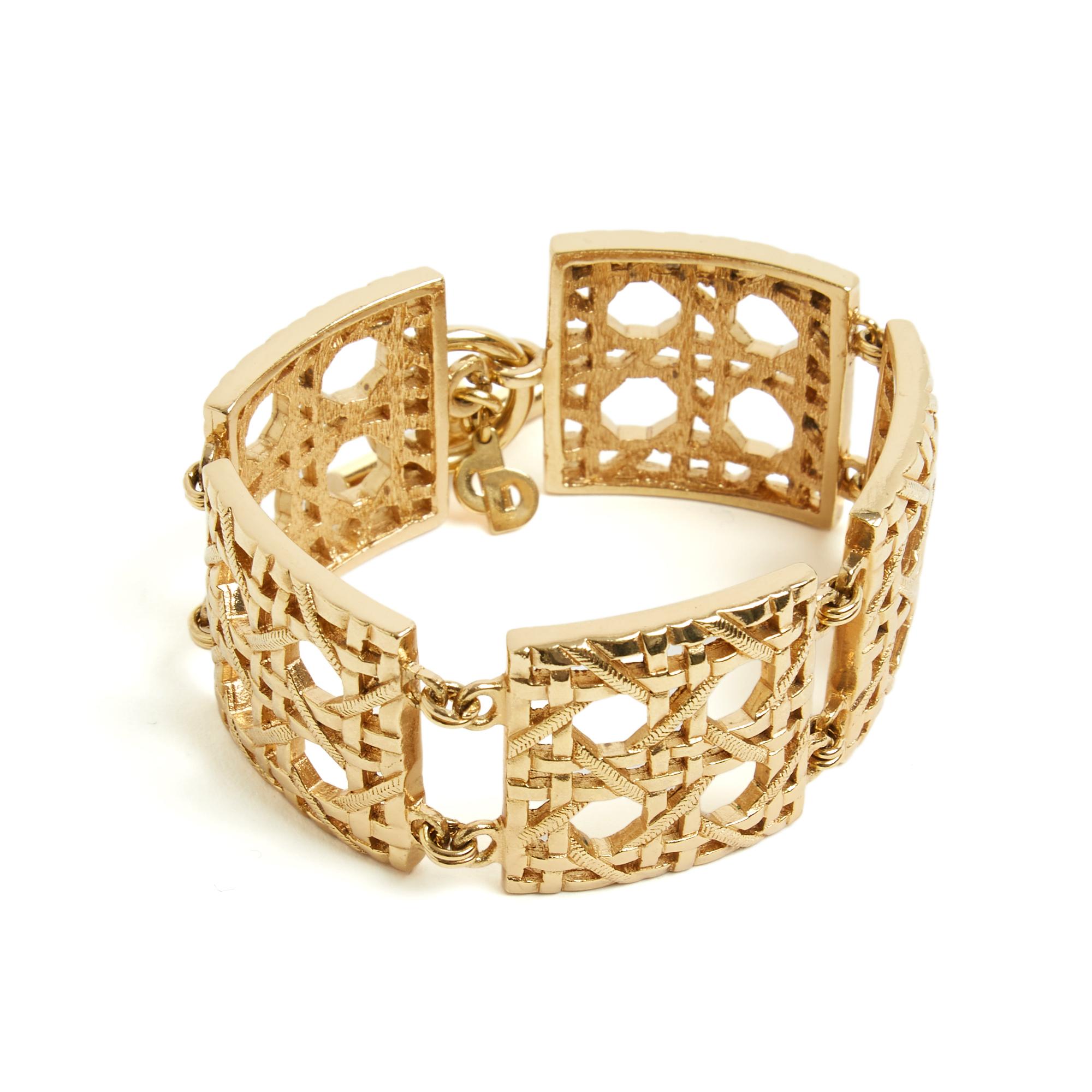 Christian Dior Armband um 1990 aus Goldmetall, gegliedert, ikonisches Cannage-Motiv, 