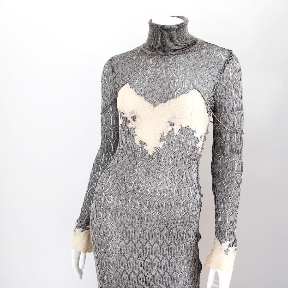 CHRISTIAN DIOR

1998. Silver-coloured dress with cream lace trim by Christian Dior by John Galliano.

This elegant dress is an extremely rare collector's item and one of Dior's must-have pieces. Known from advertisements and runway. 
Buy Now Or Cry
