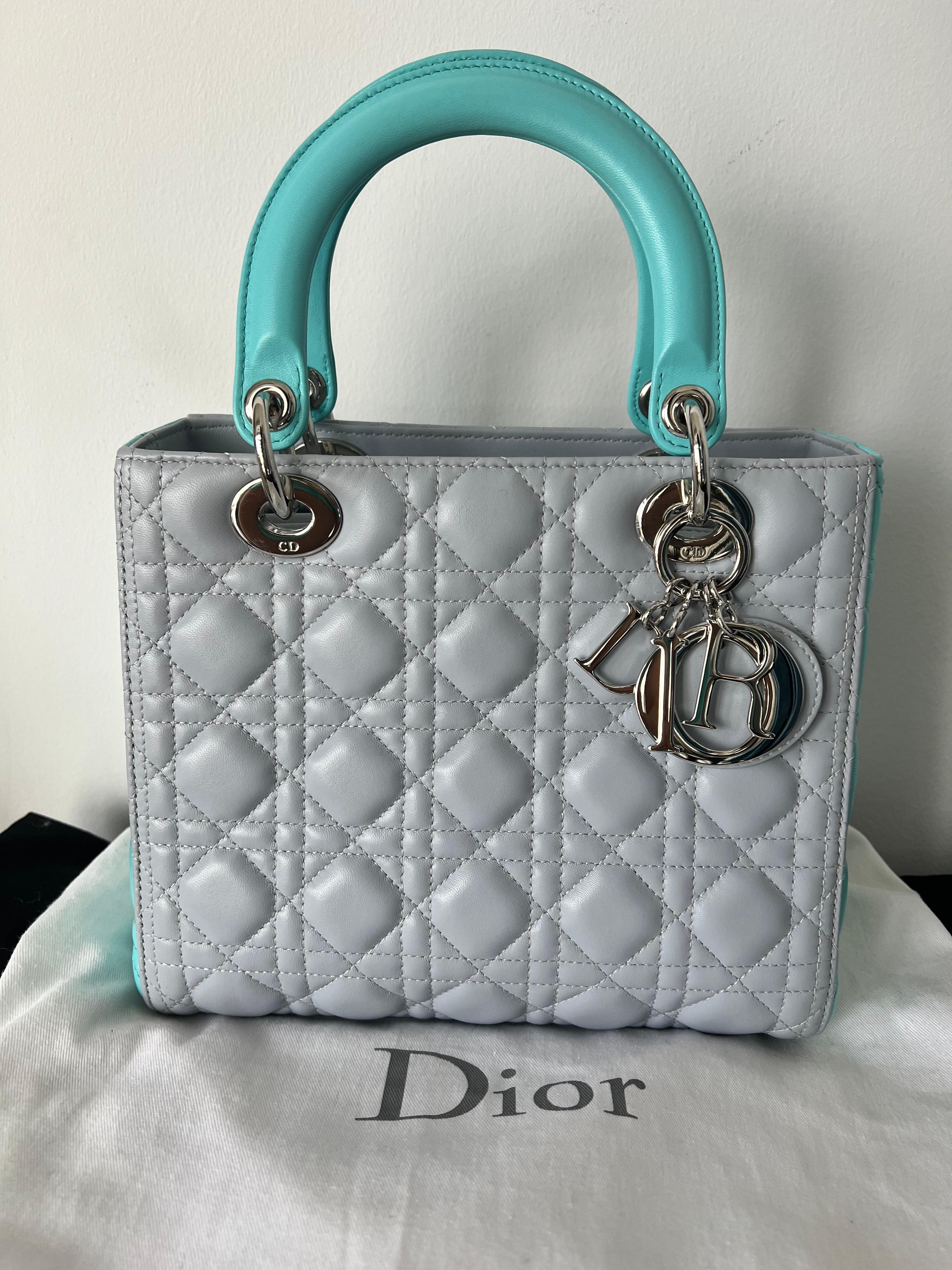 Introducing the Christian Dior Light Grey and Tiffany Blue Two-Tone Lady Dior Lamb Skin Bag: A Timeless Icon of Elegance and Luxury.

Elevate your style to new heights with the Christian Dior Light Grey and Tiffany Blue Two-Tone Lady Dior Lamb Skin