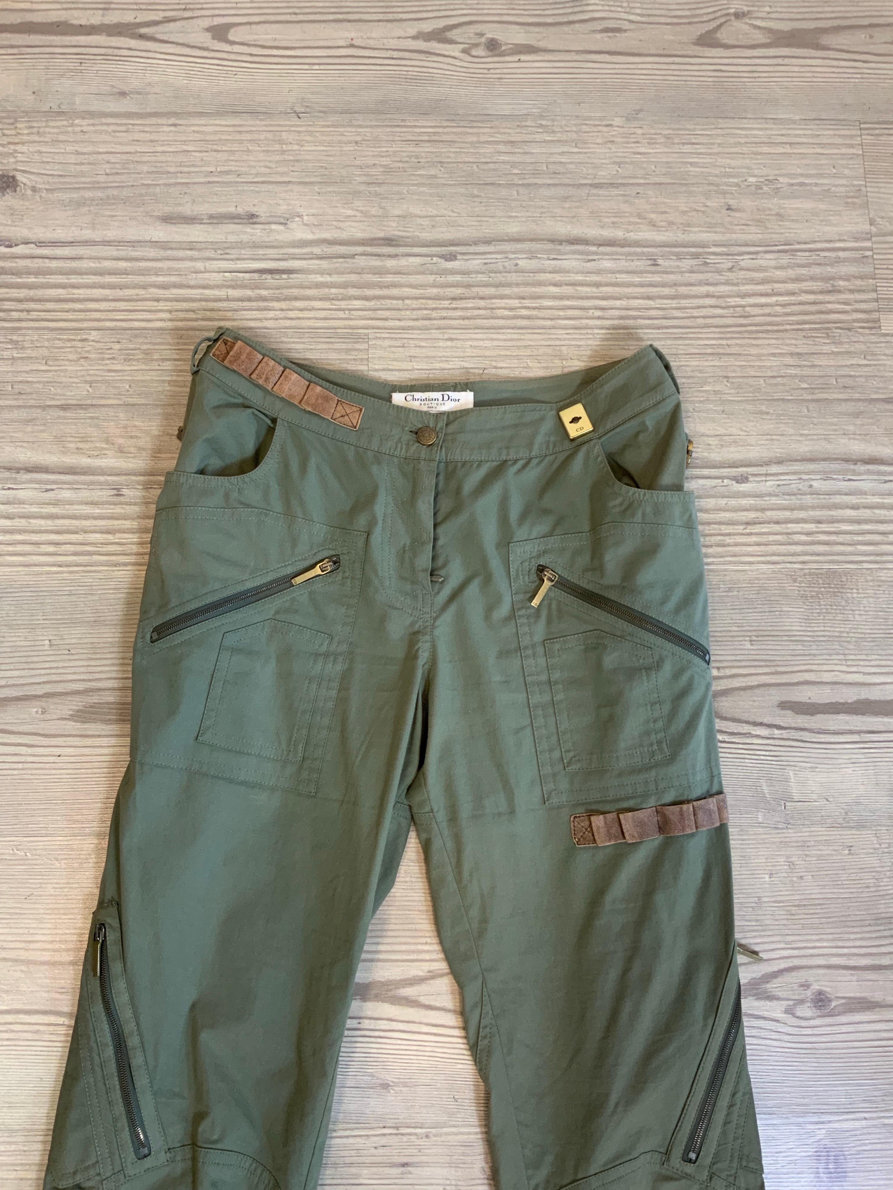 Christian Dior cargo pants. 
2000s by John Galliano.
In cotton and elastane. Military green.
Leather inserts and laces. Bronze hardware, oxidized in some places as shown in the photo.
Size 36 fr which corresponds to an Italian 40.
Waist 38 cm
Length