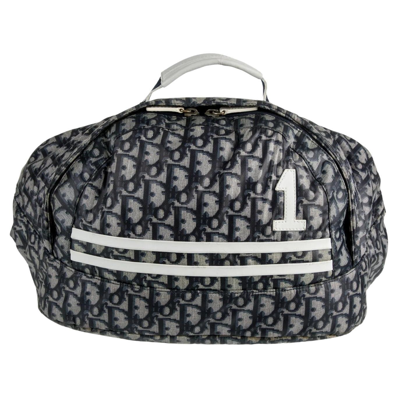 Christian Dior 2003 Rare Vintage Y2K Diorissimo Trotter Fanny Pack Waist Bag

From the 2003 Collection
Vintage
Blue Nylon with Zip Closure at Top
Diorissimo Print
Adjustable Waist Strap
Leather Trim Embellishment
Nylon Lining

Made in Italy

10.75