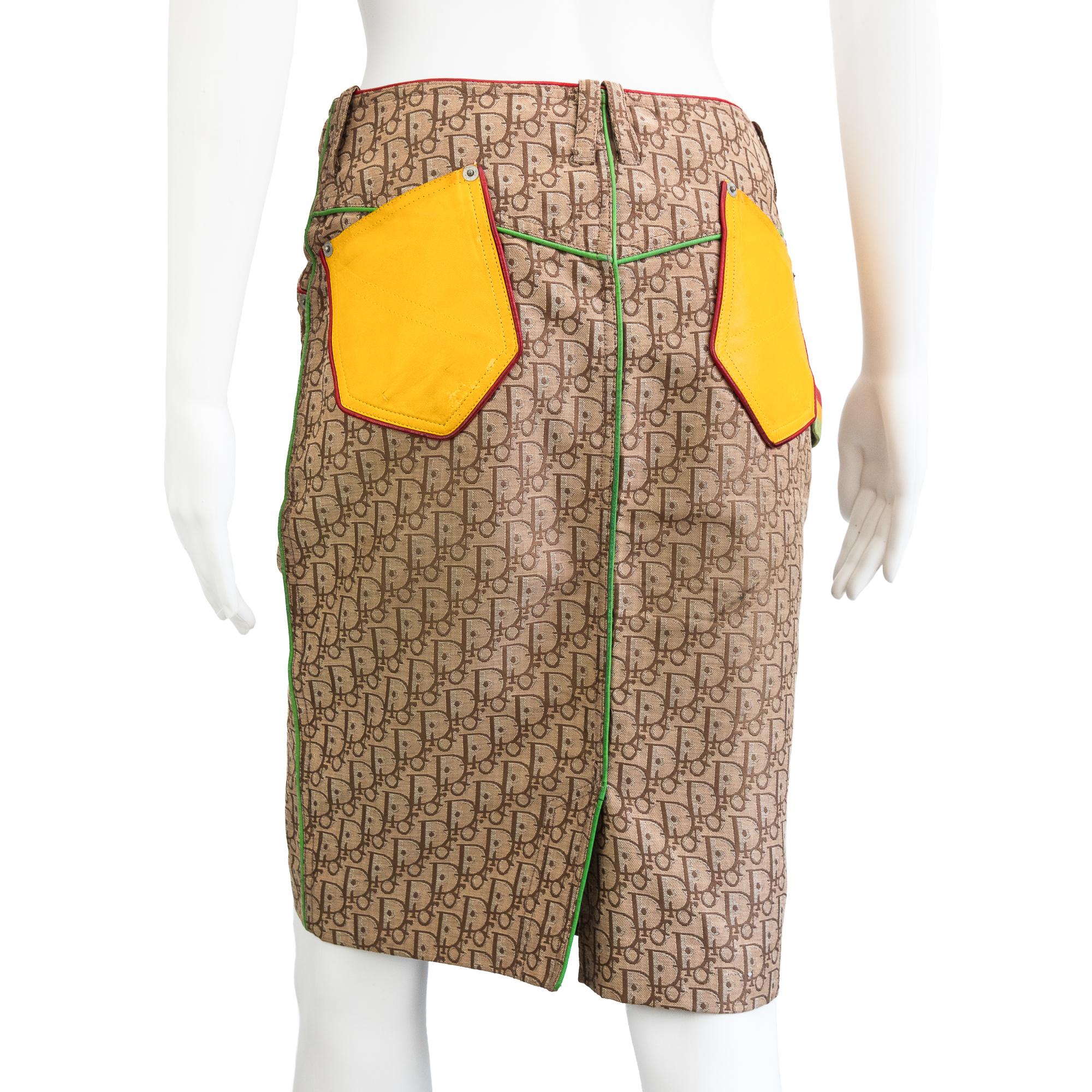 Ruder Than The Rest presents a Christian Dior by Galliano 2004 rasta collection skirt.

Brown Diorissimo monogram knee-length skirt with red, gold and green leather accents.

Full length version, can be altered to fit shorter.

Yellow leather
