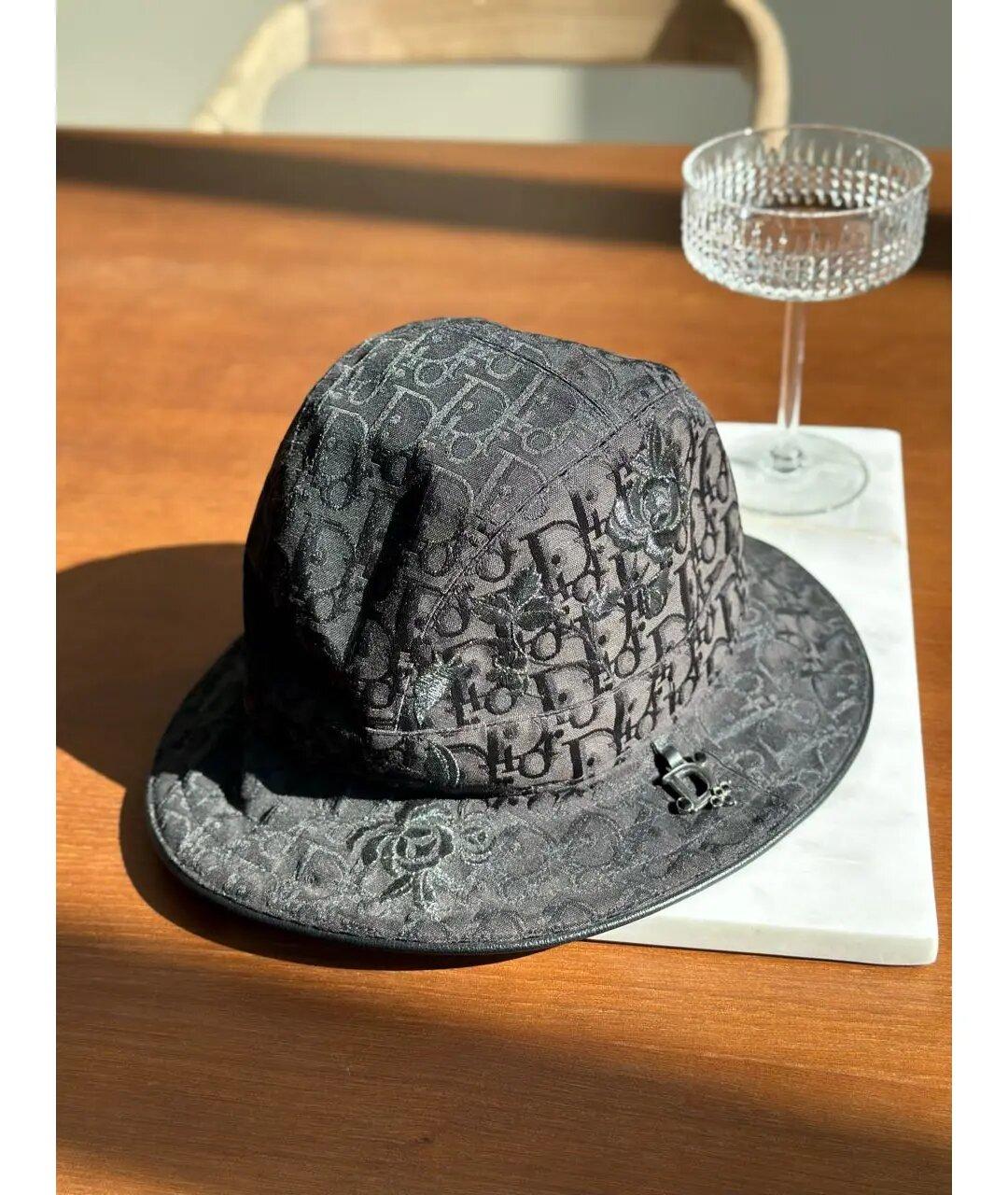 Christian Dior Vintage Trotter Embroidery black D bucket hat 
A black bucket hat decorated with the iconic Diorissimo print and a logo plaque created by John Galliano for Christian Dior in 2004.
Vintage 2000s is a rare model and it is difficult to