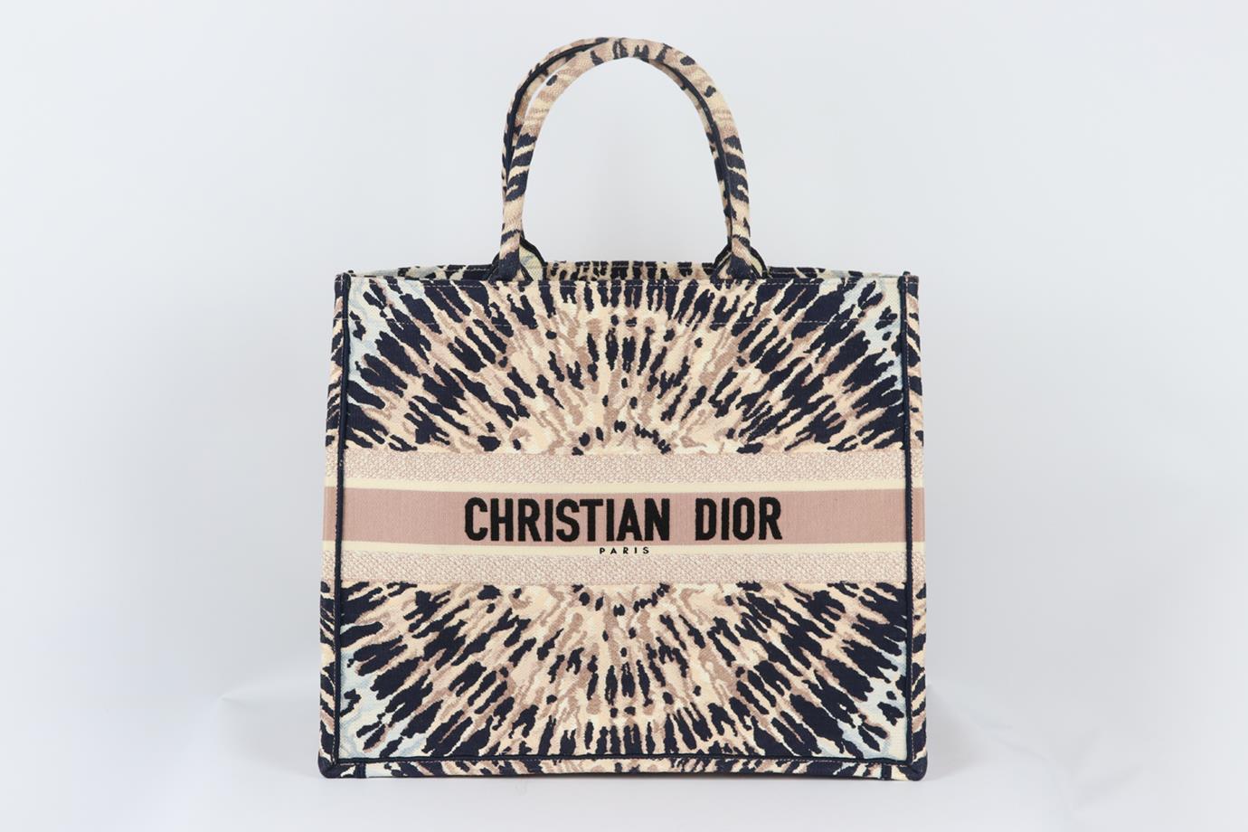 Christian Dior 2020 Book large tie dyed jacquard canvas tote bag. Made from tonal-pink tie-dyed jacquard design with the brand's iconic logo on the front, it opens to a large internal compartment. Pink. Open top. Does not come with dustbag or box.