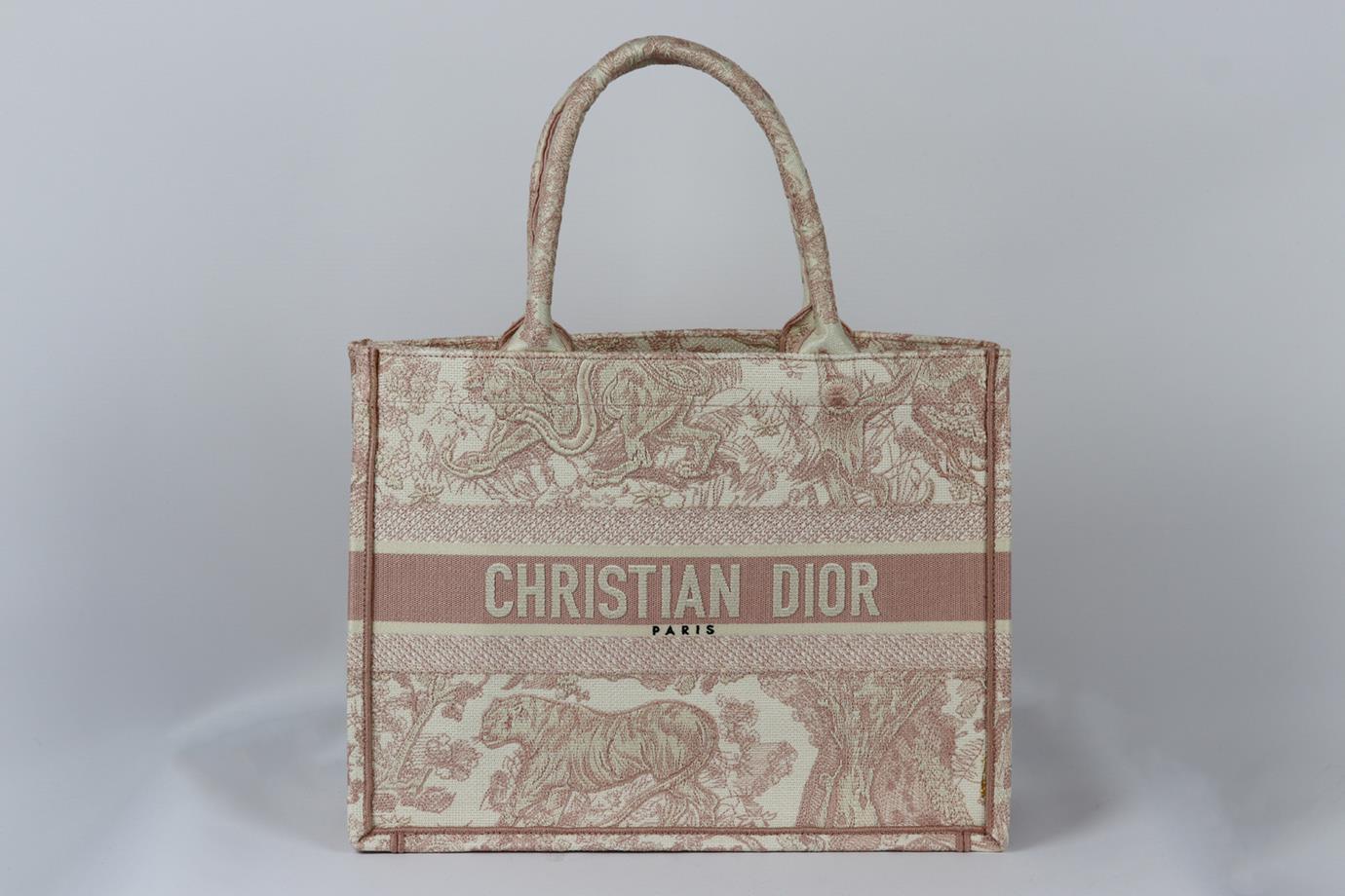 Christian Dior 2020 Book medium toile de joy jacquard canvas tote bag. Made from pink and white toile de jouy design with the brand's iconic logo on the front, it opens to a large internal compartment. Pink and white. Open top. Does not come with