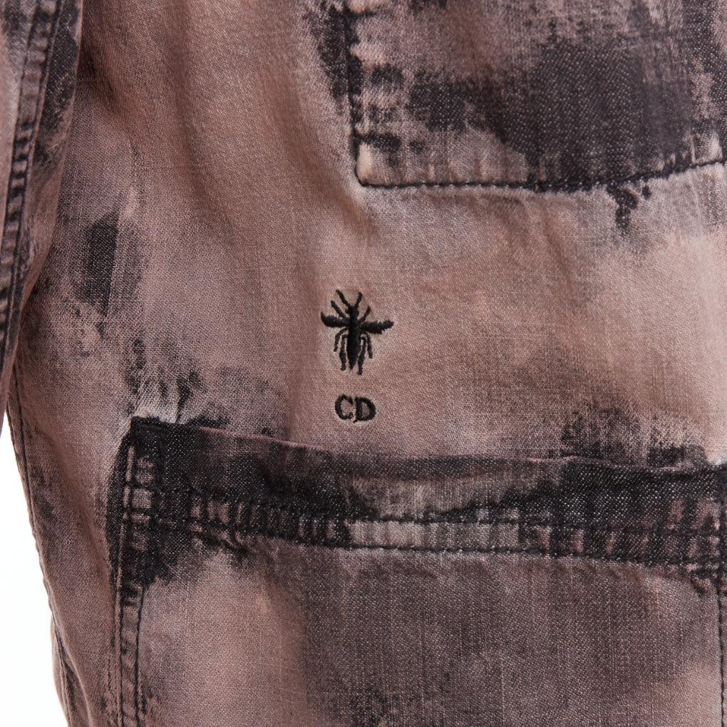 CHRISTIAN DIOR 2020 purple acid wash tie dye bee overshirt jacket FR38 M
Reference: NKLL/A00339
Brand: Dior
Designer: Maria Grazia Chiuri
Collection: SS2020
Material: Cotton
Color: Purple
Pattern: Tie Dye
Closure: Button
Extra Details: CD bee logo