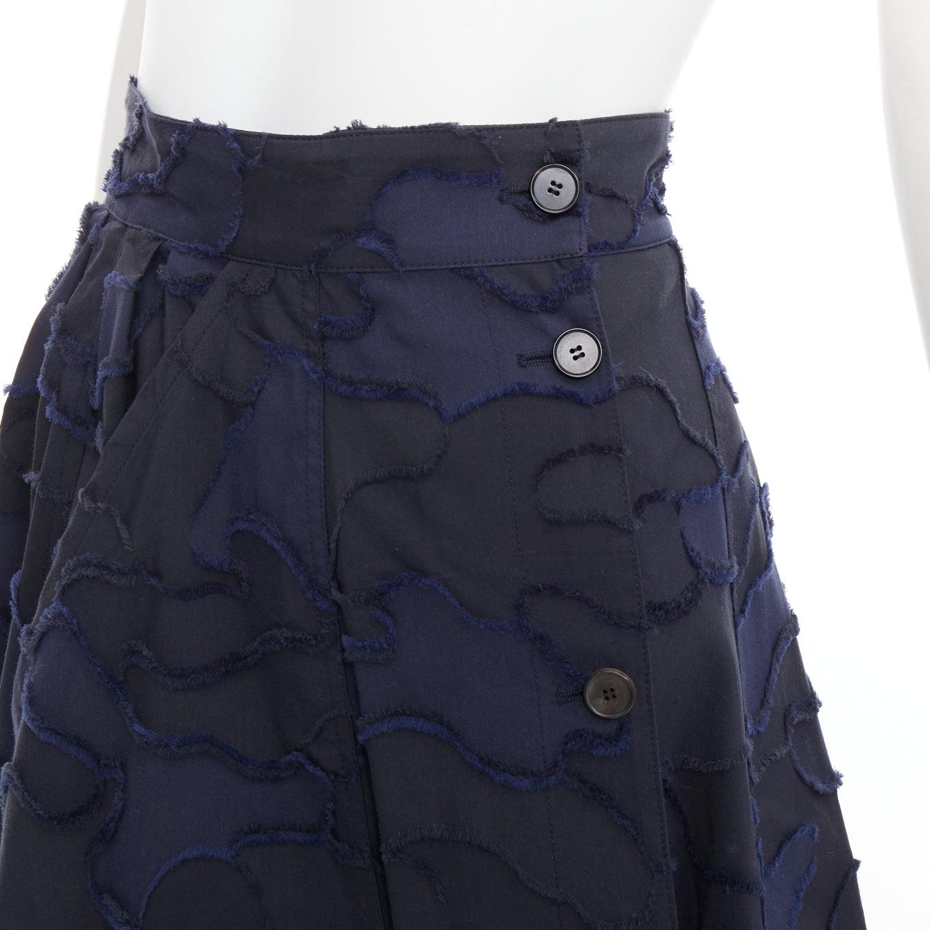 CHRISTIAN DIOR 2020 Runway navy cotton camouflage jacquard midi skirt FR34 XS
Reference: YIKK/A00239
Brand: Dior
Designer: Maria Grazia Chiuri
Collection: AW 2020 - Runway
As seen on: Unbreakable Kimmy Schmit
Material: Cotton, Blend
Color:
