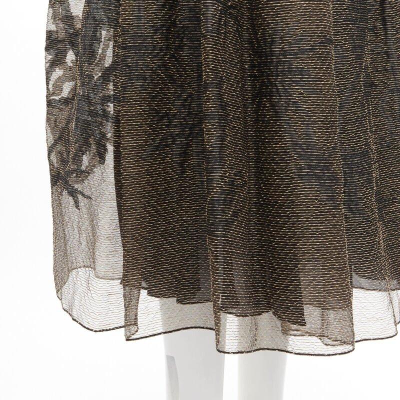 CHRISTIAN DIOR 2021 linen silk gold black leaf pattern faille full skirt FR36 XS
Reference: AAWC/A00003
Brand: Dior
Designer: Maria Grazia Chiuri
Model: 021J12A7107
Collection: 2021 - Runway
Material: Linen, Silk
Color: Gold, Black
Pattern: