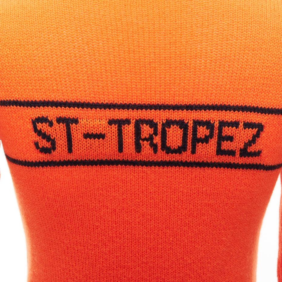 CHRISTIAN DIOR 2022 100% cashmere orange star logo long sleeve button sweater FR34 XXS
Reference: AAWC/A00815
Brand: Dior
Designer: Maria Grazia Chiuri
Collection: 2022
Material: Cashmere
Color: Orange, Black
Pattern: Star
Closure: Slip On
Extra
