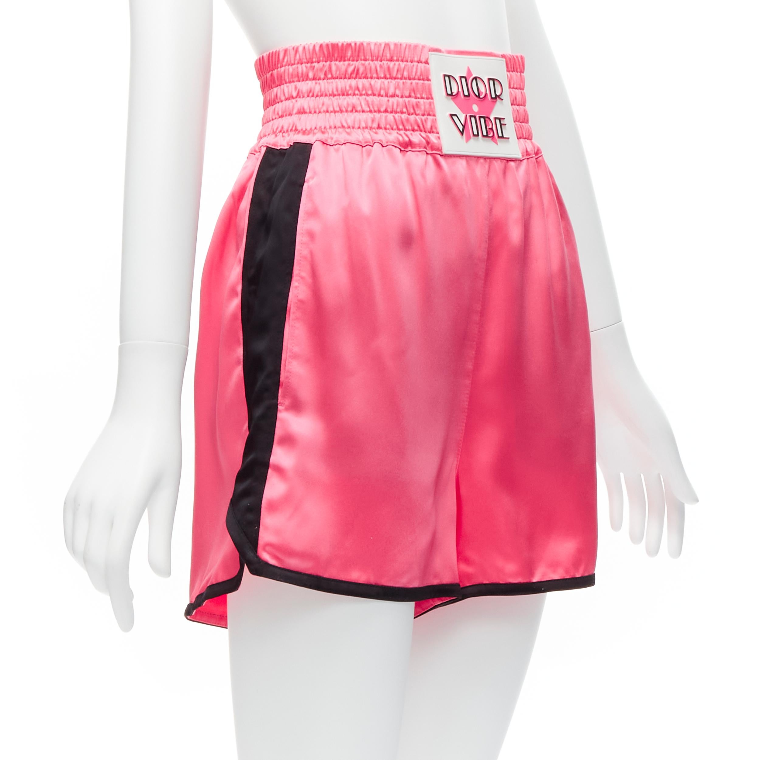 CHRISTIAN DIOR 2022 Dior Vibe pink satin black panels boxing shorts XS
Reference: AAWC/A00494
Brand: Dior
Designer: Maria Grazia Chiuri
Collection: 2022 Dior Vibe
Material: Viscose
Color: Pink, Black
Pattern: Solid
Closure: Elasticated
Extra