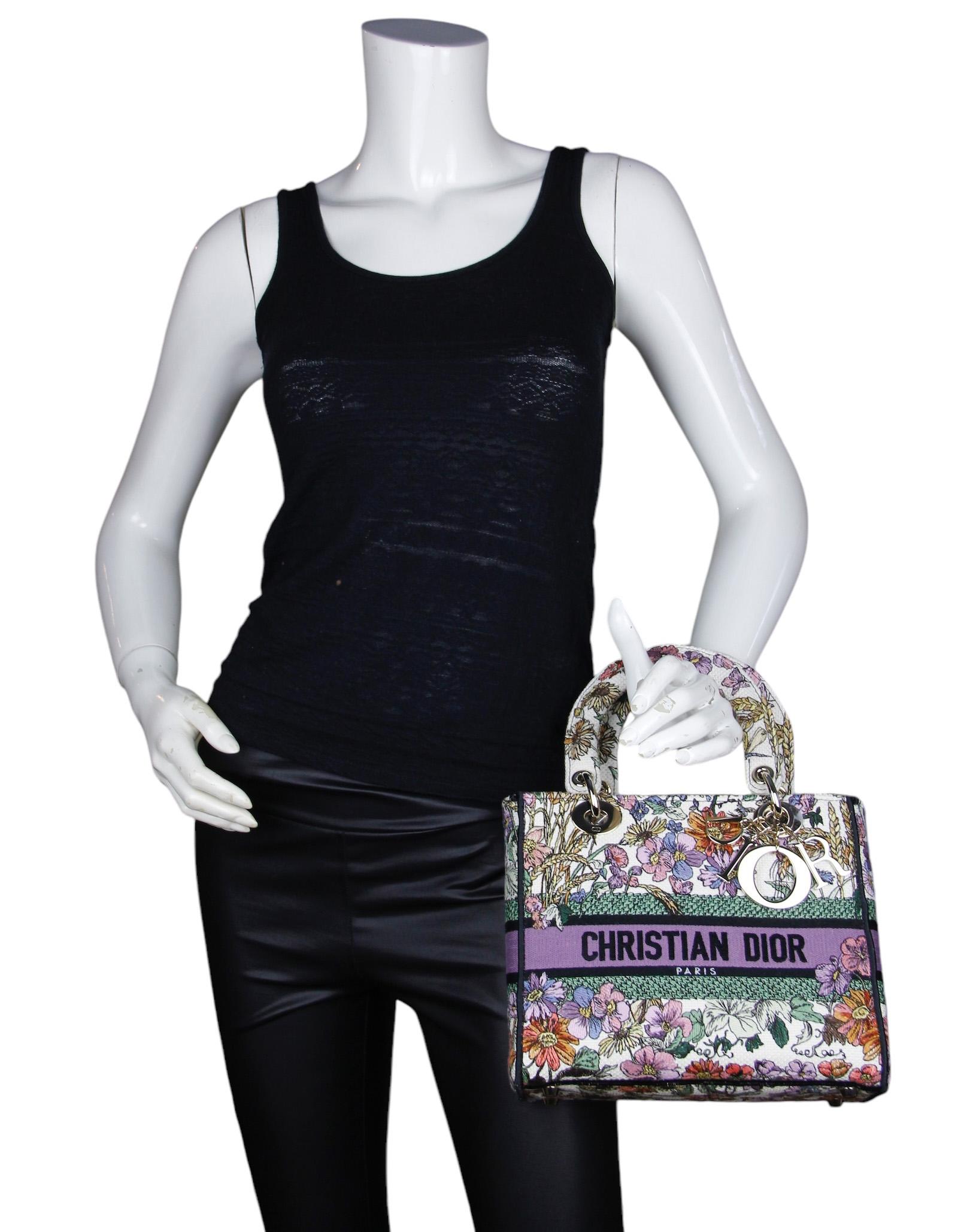 Christian Dior 2024 Floral Embroidered Canvas Medium Lady D-Lite

Made In: Italy
Year of Production: 2024
Color: Multicolor with purple accents
Hardware: Pale goldtone
Materials: Canvas
Lining: Unlined 
Closure/Opening:Center flap
Exterior Pockets: