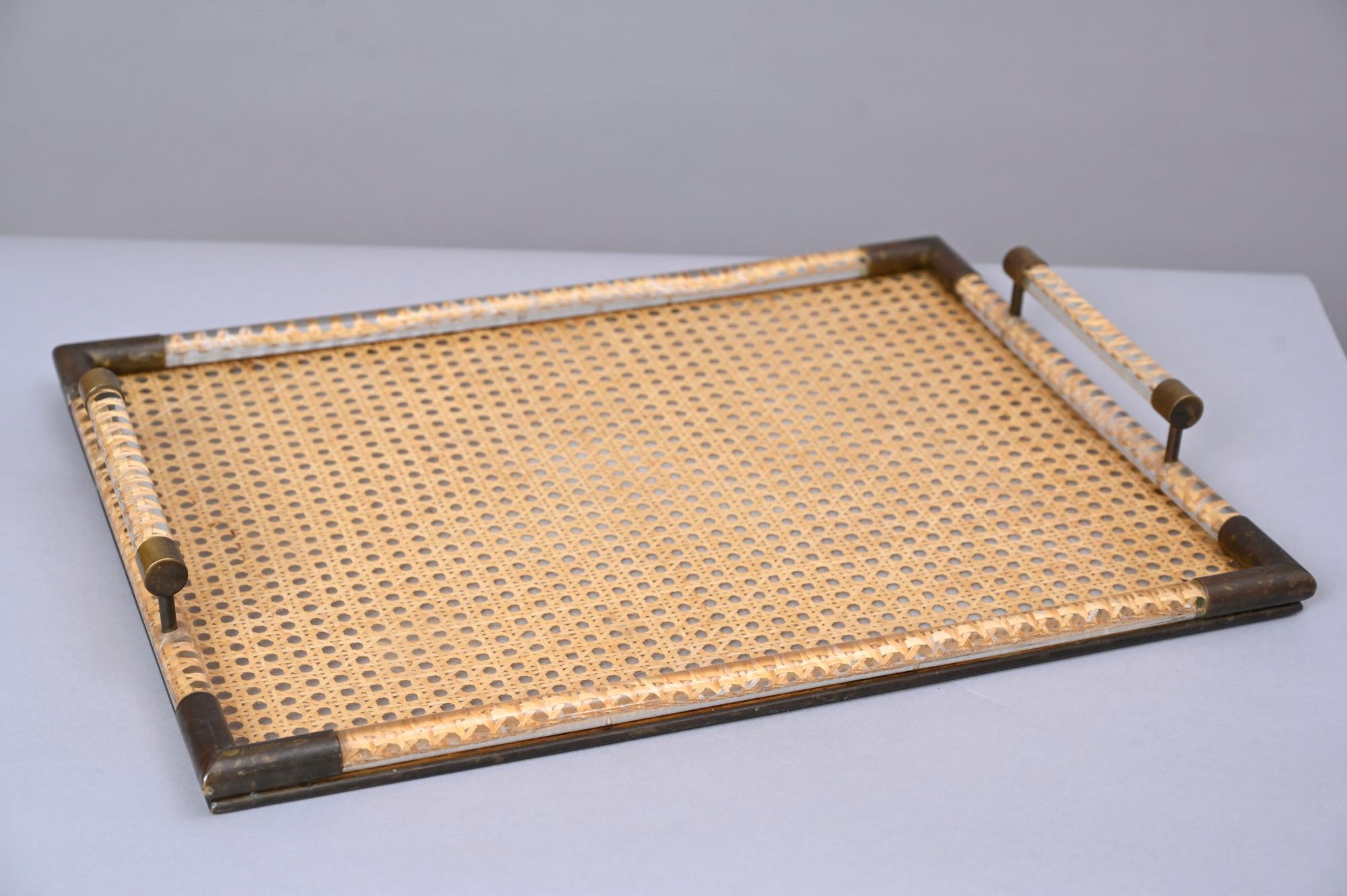 Lovely quality lucite and Vienna straw tray with brass details. c1970

In excellent vintage condition.