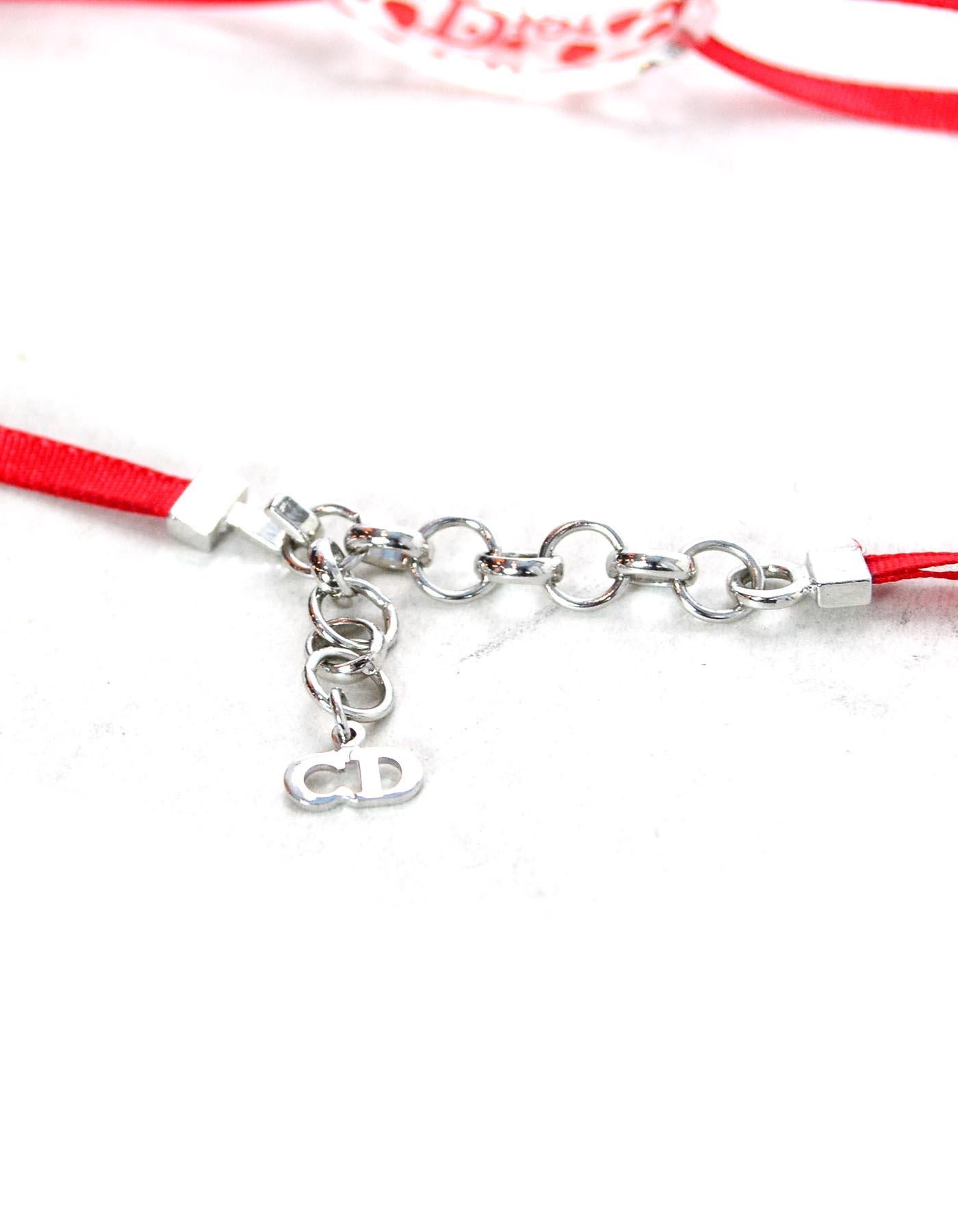red ribbon necklace