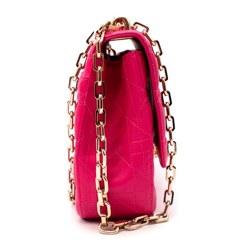 Christian Dior Addict Pink Leather Cannage Quilted Bag
 

 - Vibrant fuchsia pink lambskin leather bag featuring the Maison's signature cannage quilting 
 - Flap bag, with gold-tone metal pushlock, and chain link shoudler strap, and CG logo charm 
