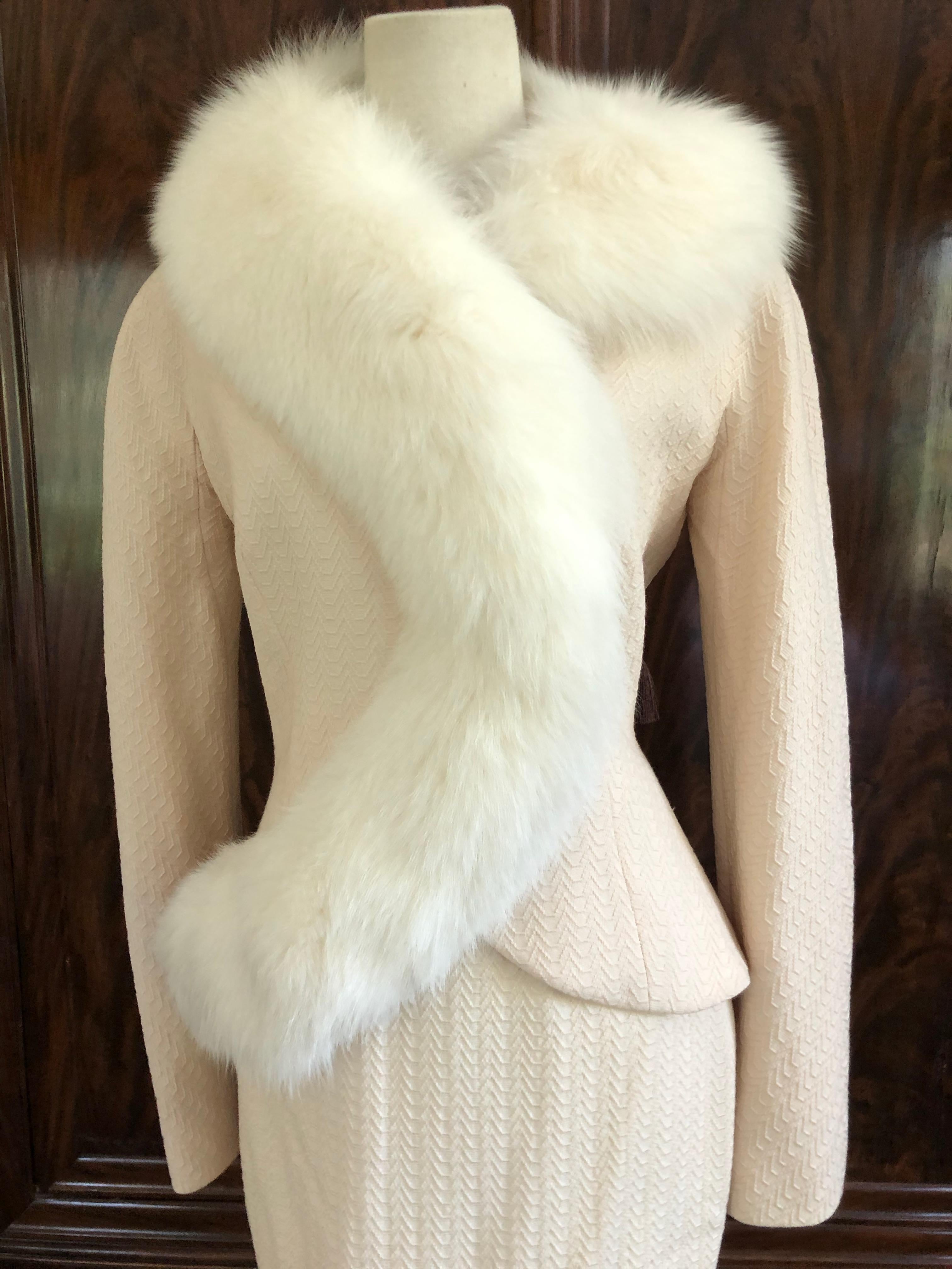 Christian Dior by John Galliano vintage wool suit with extravagant fox fur trim
Lined in silk .
 Size 42
Bust 39
