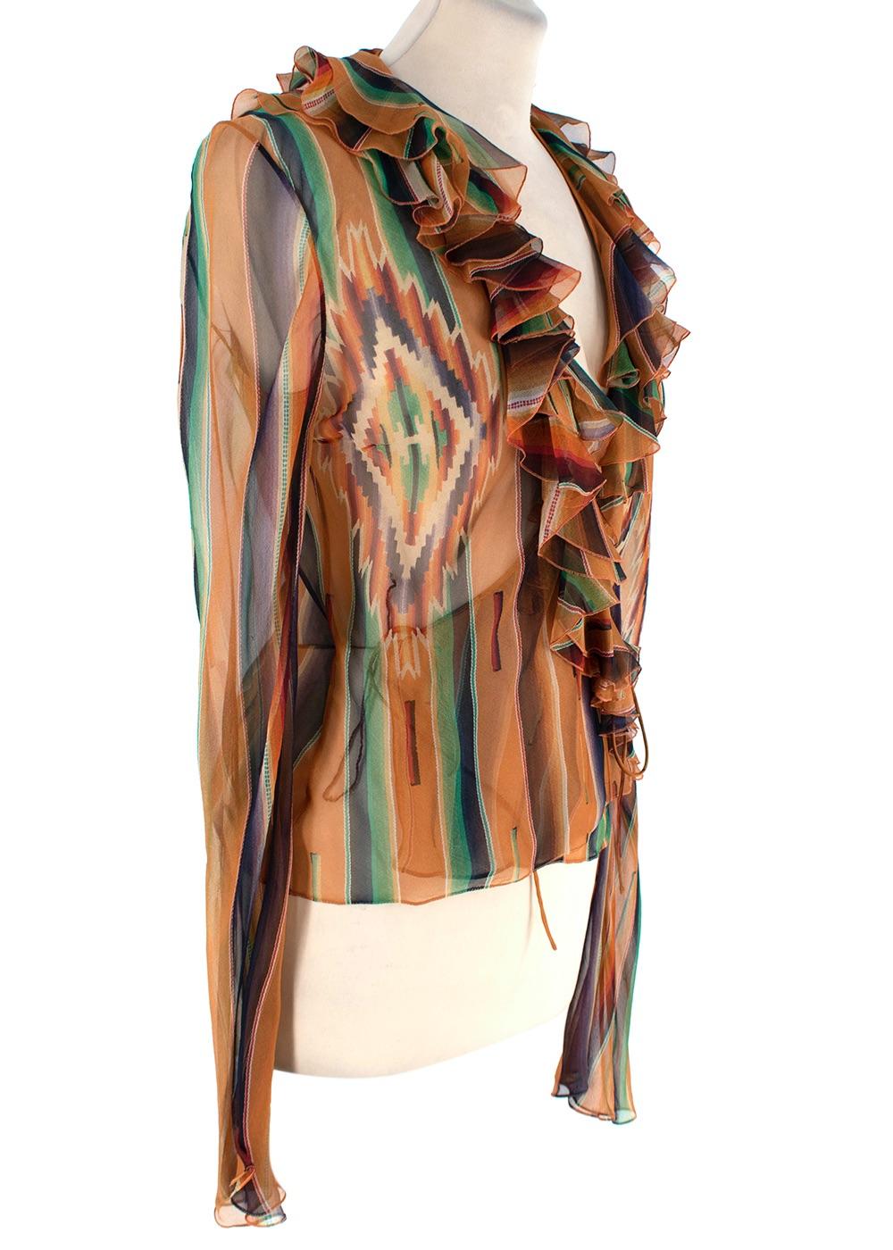 Christian Dior Aztec Print Ruffled Chiffon Wrap Blouse

- Aztec style print sheer silk chiffon
- Ruffled collar, self-tie wrap front
- Long sleeves

Shoulder: 38 cm 
Chest: 42 cm 
Sleeve Length: 70 cm 
Length: 60 cm 

Flat, seam to seam

This item