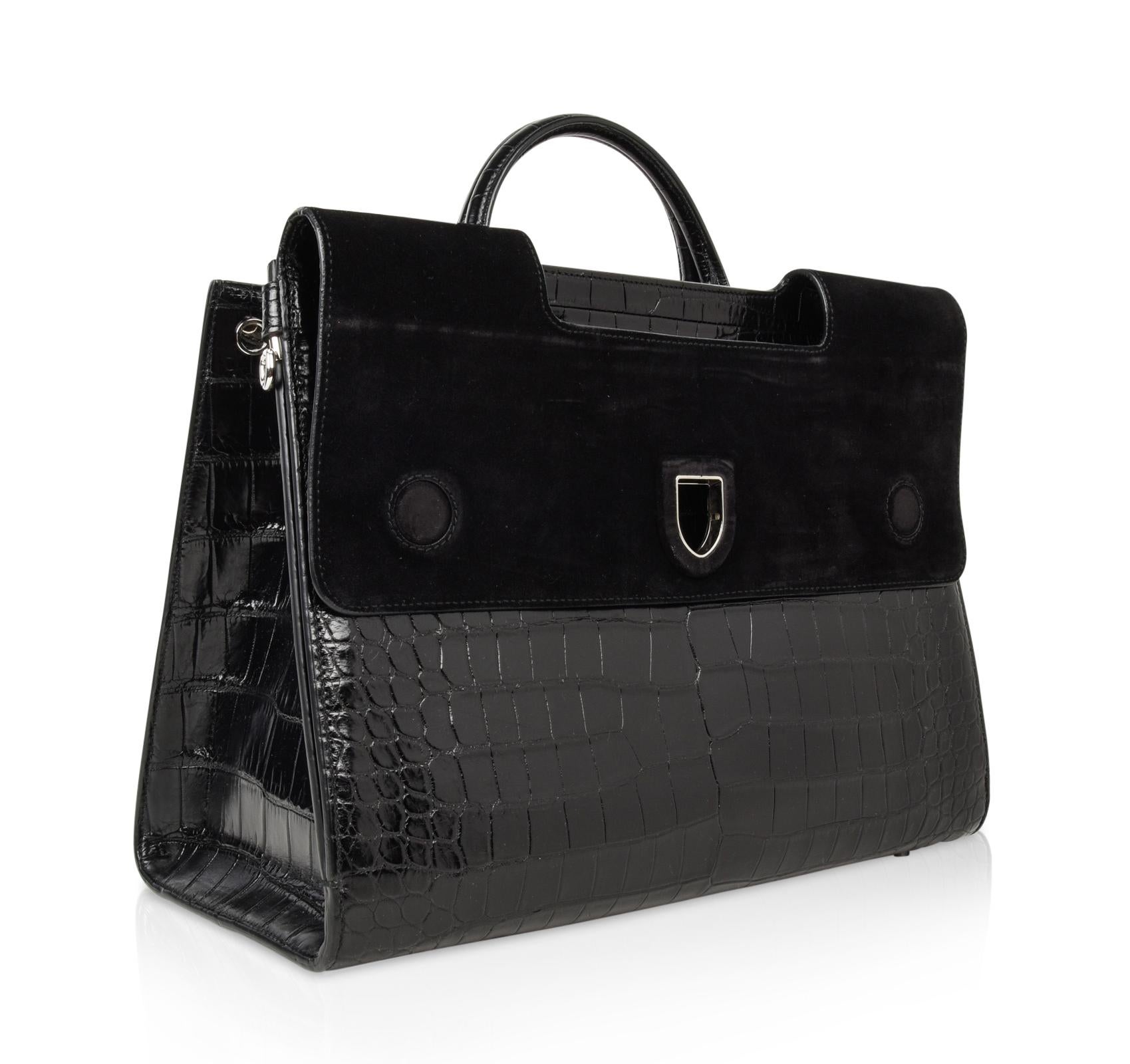 Guaranteed authentic rare Christian Dior Diorever matte crocodile Black bag which converts to a tote style.
Architectural flap with cutout for handles opens to black suede under the flap. 
The flap is held with hidden magnets both front and rear so