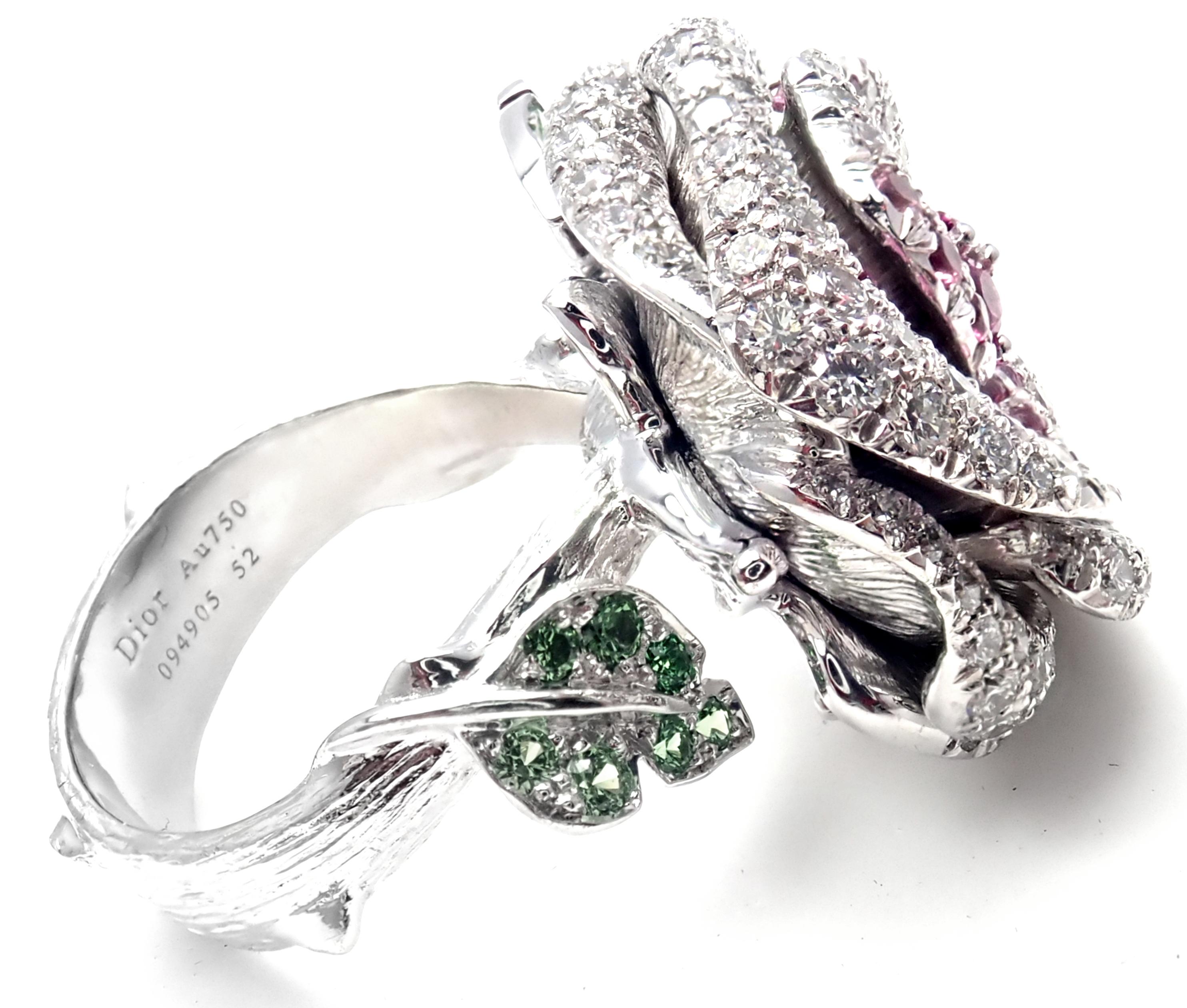 18k White Gold Bagatelle Flower Diamond And Pink Sapphire by Christian Dior. 
With rround brilliant cut diamonds VVS1 clarity, E color total weight approx. 1.73ct
Pink sapphires
Tsavorite garnets
This ring comes with Dior certificate and a Dior