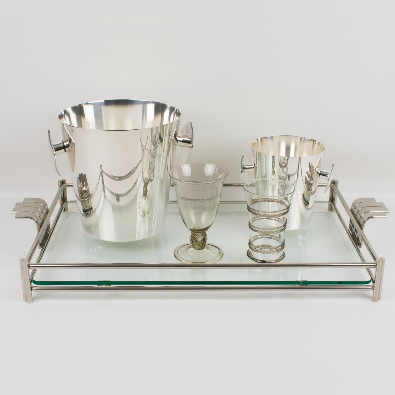 Sophisticated 1980s modernist barware serving tray platter designed for Christian Dior Home Collection. Large rectangular butler shape builds with silvered metal framing and thick glass slab insert. Elegant raised handles on the sides. The engraved