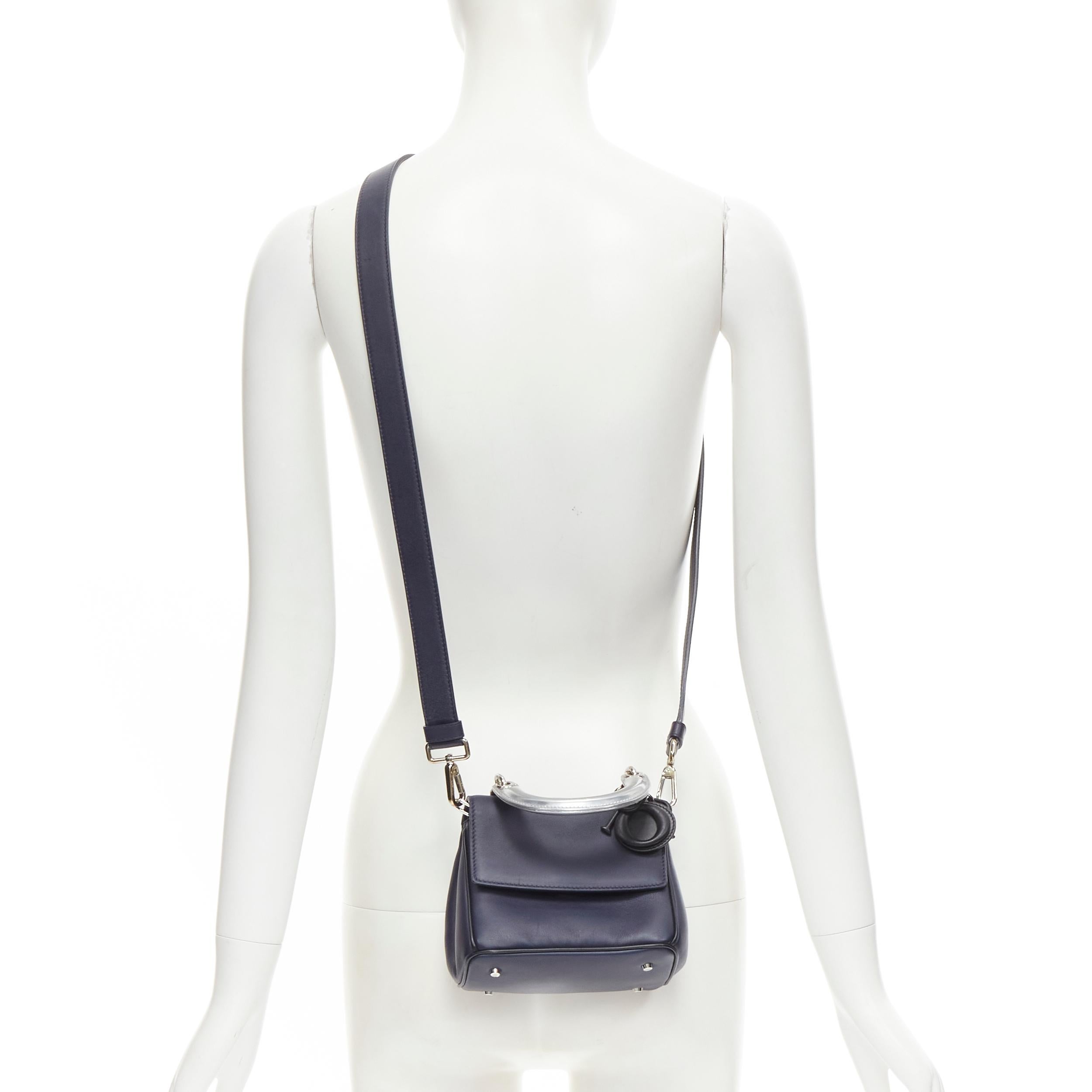 CHRISTIAN DIOR Be Dior Micro blue silver leather flap small shoulder bag 
Reference: LNKO/A01924 
Brand: Christian Dior 
Model: Micro Be Dior 
Material: Leather 
Color: Navy 
Extra Detail: We all have a soft spot for its design; a reinforced leather