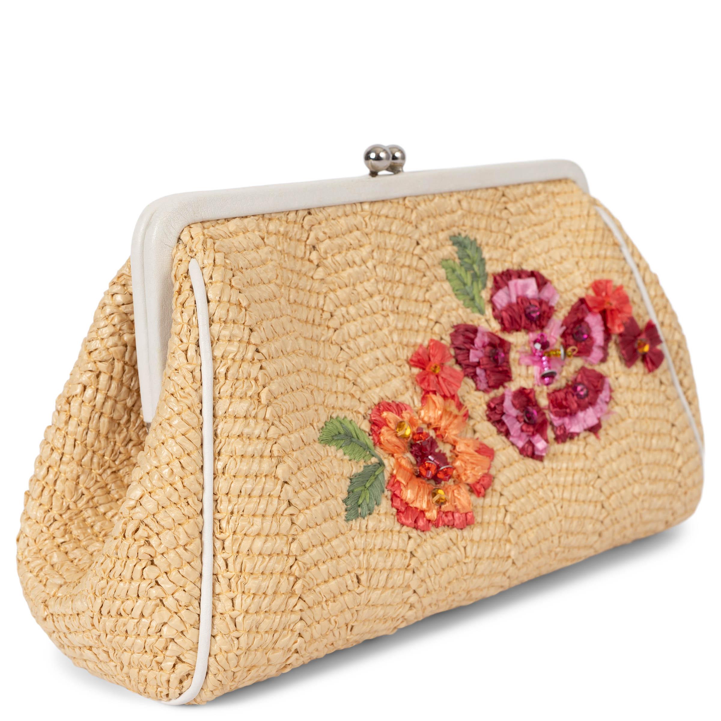 100% authentic Christian Dior frame clutch in natural beige raffia. Features pink and red floral embroidery with bead embellishments, white leather trims and silver-tone hardware. Closes with a kisslock on top and is lined in beige Oblique canvas