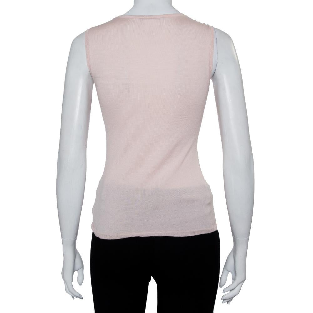 Well-made and comfortable, this sleeveless jumper from Christian Dior will undoubtedly lift your casual style. Offering a wonderful fit, it is knit using quality cashmere and silk, and features the CD logo at the front. Balance this creation with a