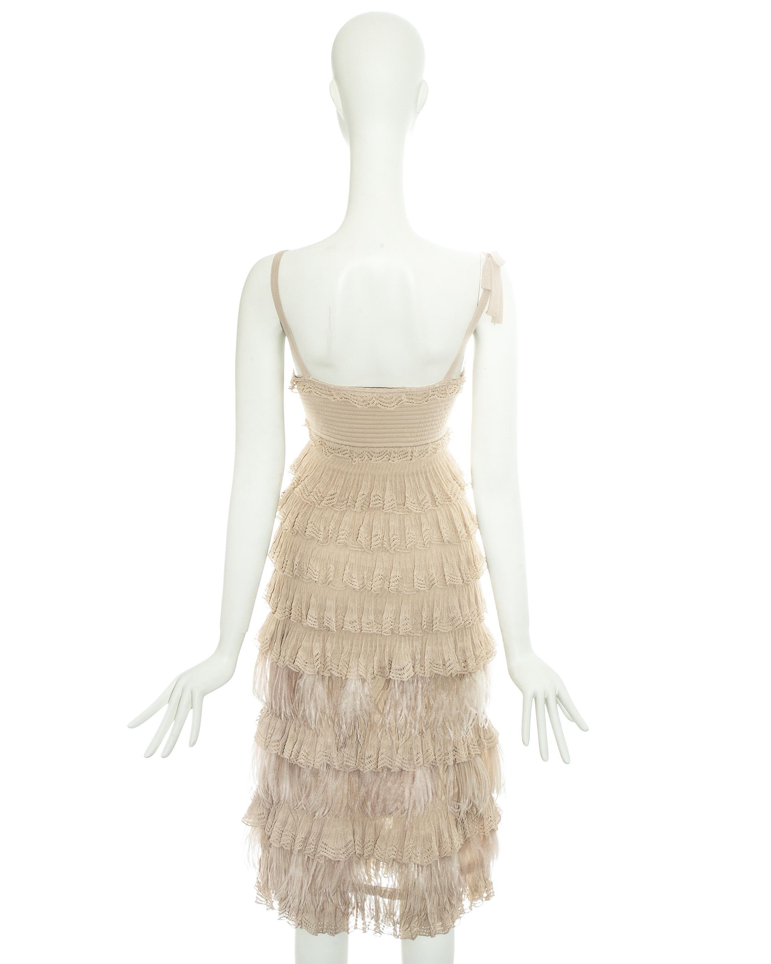 Beige Christian Dior beige knitted ruffled dress with ostrich feathers, fw 2011