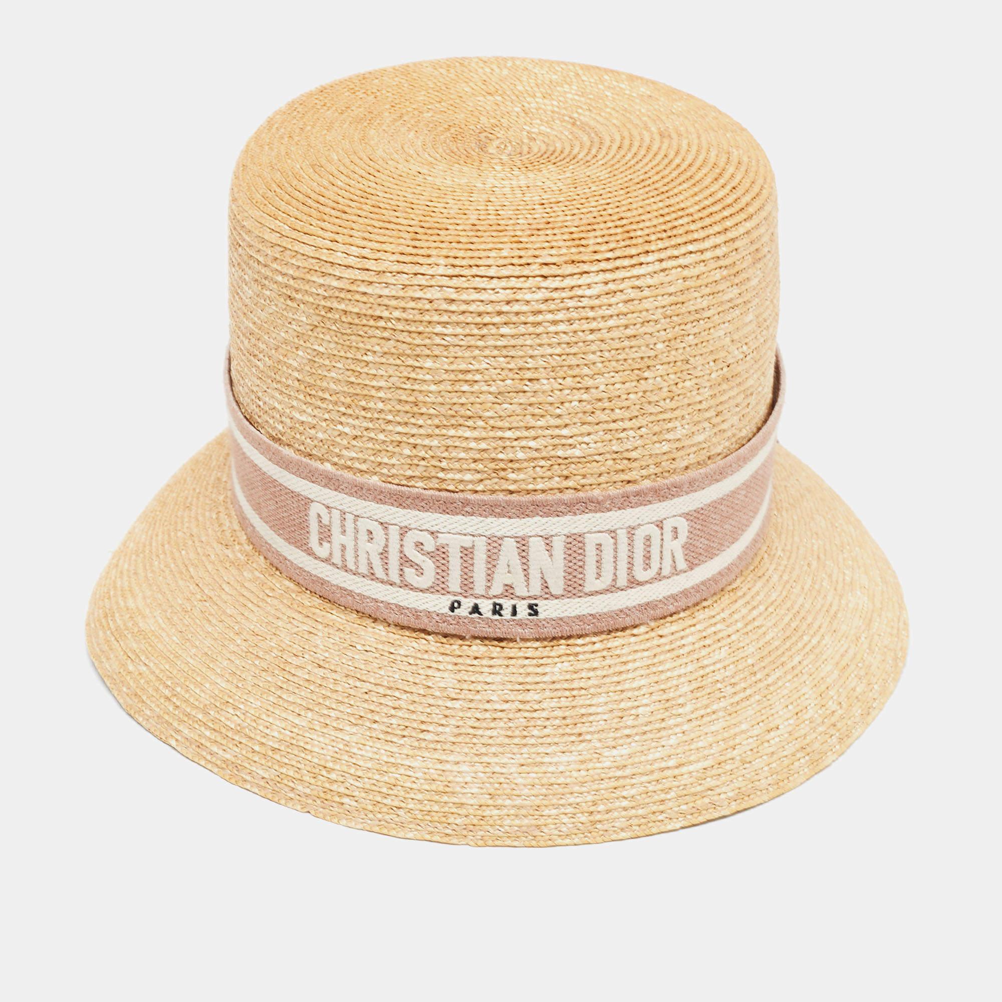 With this chic and gorgeous Dioresort hat from the House of Christian Dior, your style will look polished! It is crafted using straw material, with a logo band detail highlighting its shape. Match this hat with your summer outfits and exude nothing