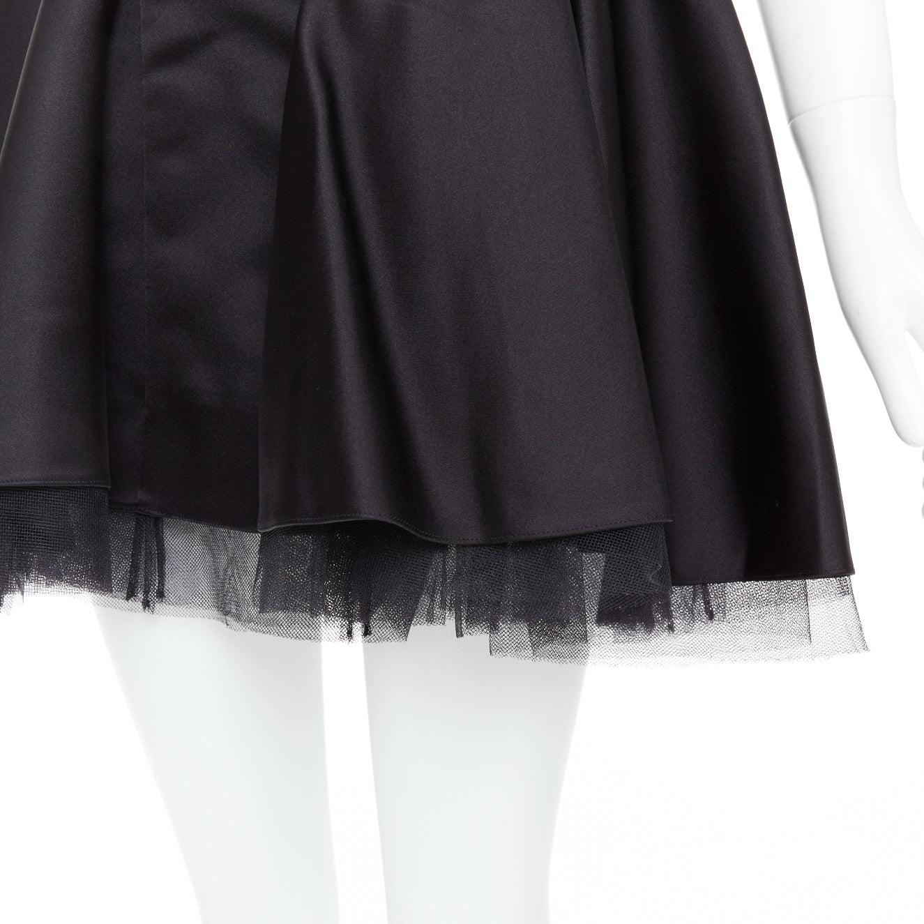 CHRISTIAN DIOR black 100% silk satin tulle hem A-line mini dress FR34 XS
Reference: GEGG/A00075
Brand: Dior
Material: Silk
Color: Black
Pattern: Solid
Closure: Zip
Lining: Black Silk
Extra Details: Tulle lined hem. Silk lined.
Made in: