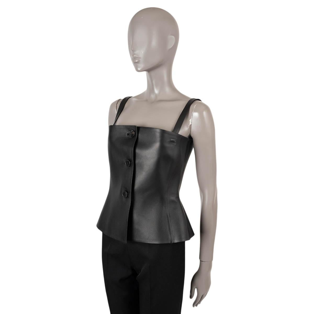 100% authentic Christian Dior bustier tank top in black lambskin leather (100%). Features removable shoulder straps. Closes with buttons on the front and is unlined. Has been worn and is in excellent condition. CD logo belt is missing. 

2020