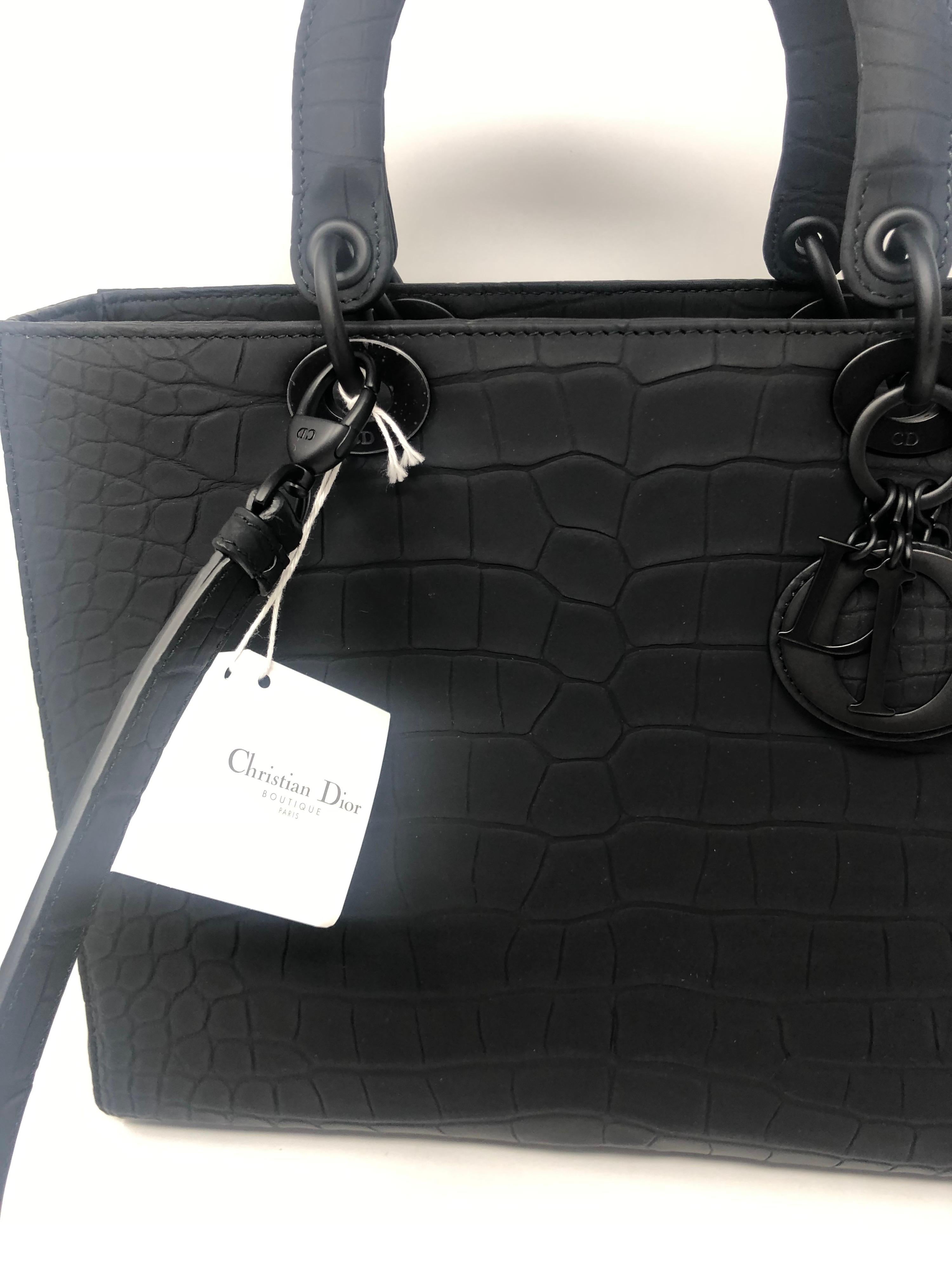 Christian Dior Black Alligator Bag. Lady Dior Bag large size with strap. Brand new. Retail over $45,000. Never used. Rare exotic leather with paperwork included. Original tags from Dior and dust cover. Don't miss out on this opportunity to own this
