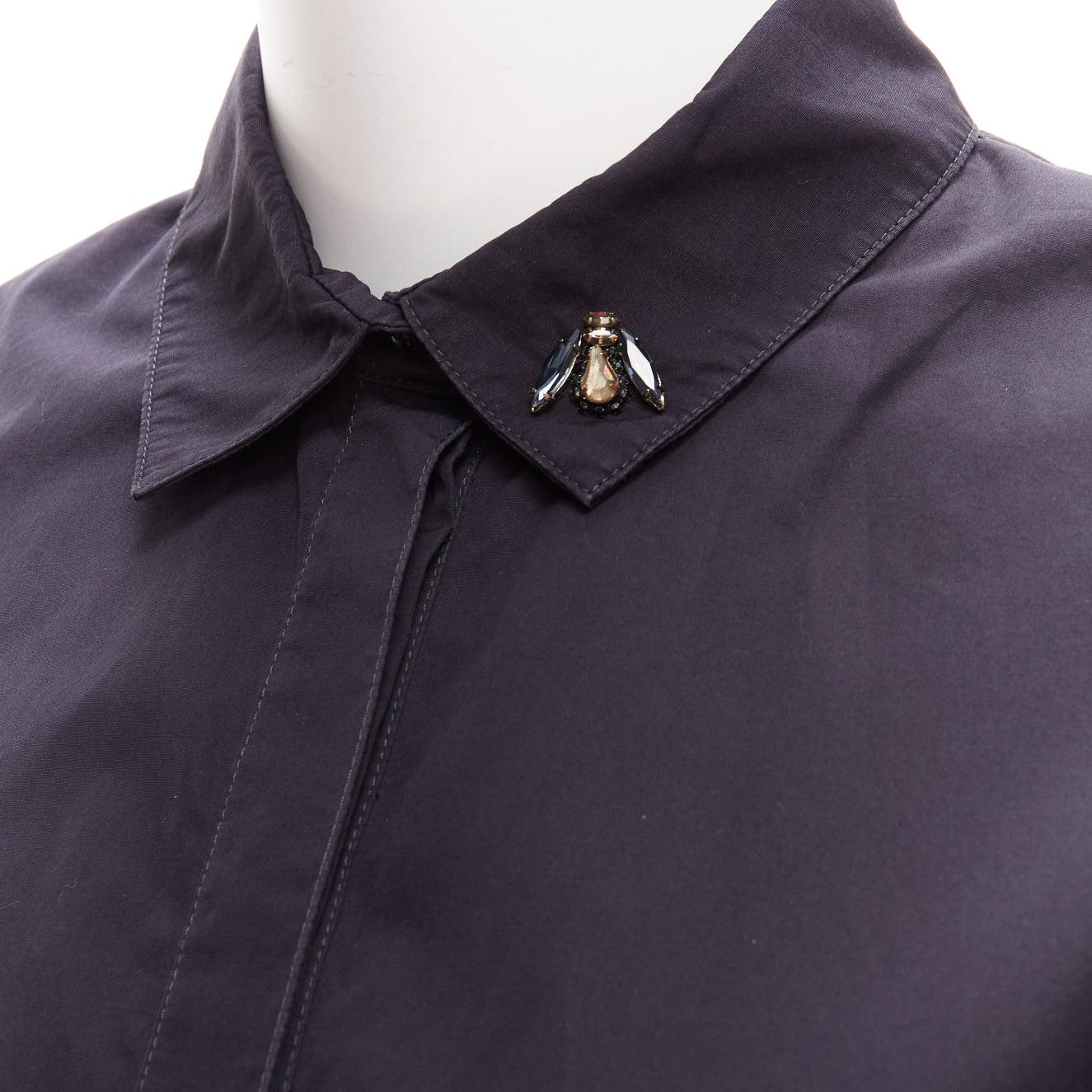 CHRISTIAN DIOR black bee crystal embellished collar ruffle hem shirt dress S
Reference: NKLL/A00031
Brand: Dior
Material: Fabric
Color: Black
Closure: Button
Made in: Italy

CONDITION:
Condition: Very good, this item was pre-owned and is in very