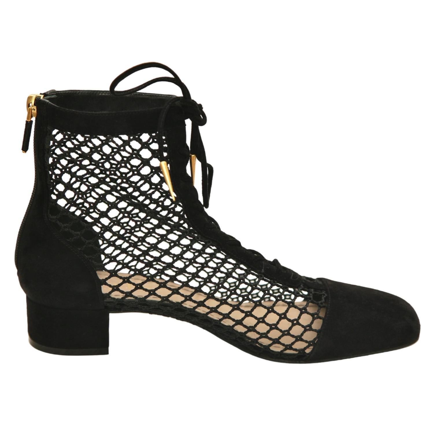 GUARANTEED AUTHENTIC CHRISTIAN DIOR NAUGHTILY-D BLACK SUEDE LACE-UP BOOTS

Details:
- Black suede uppers.
- Lace-up.
- Rear zipper closure.
- Black suede block heels.
- Leather insole and sole.
- Comes with designer dust bag.

Size: 38

Measurements