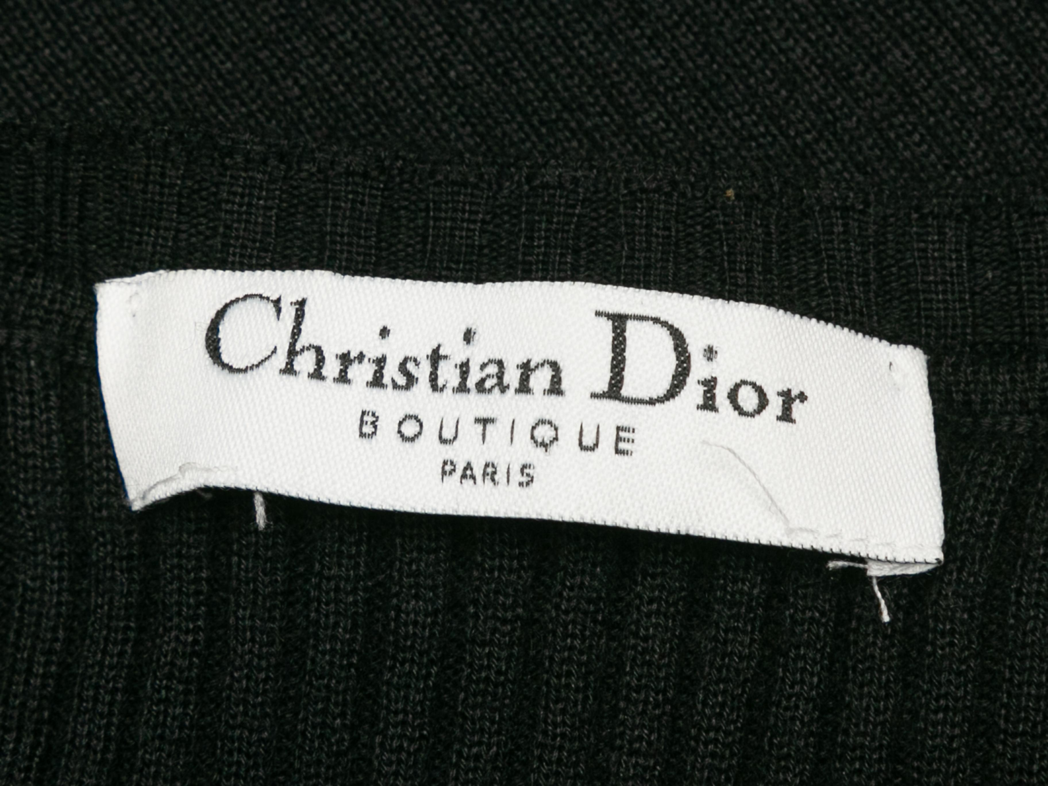 Product details: Vintage black ribbed short sleeve top by Christian Dior Boutique. V-neck. 28
