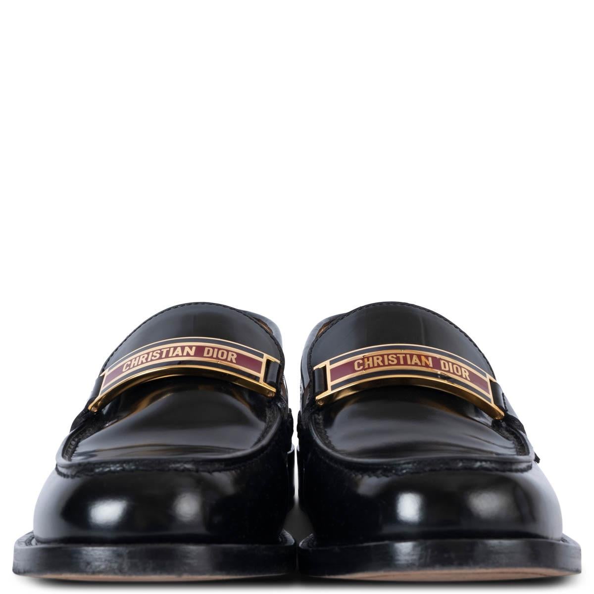 100% authentic Christian Dior Code classic loafers in black shiny leather with gold-tone, burgundy and black logo plate. Have been worn and are in excellent condition. 

Measurements
Imprinted Size	38 (fit big)
Shoe Size	38.5
Inside Sole	25cm