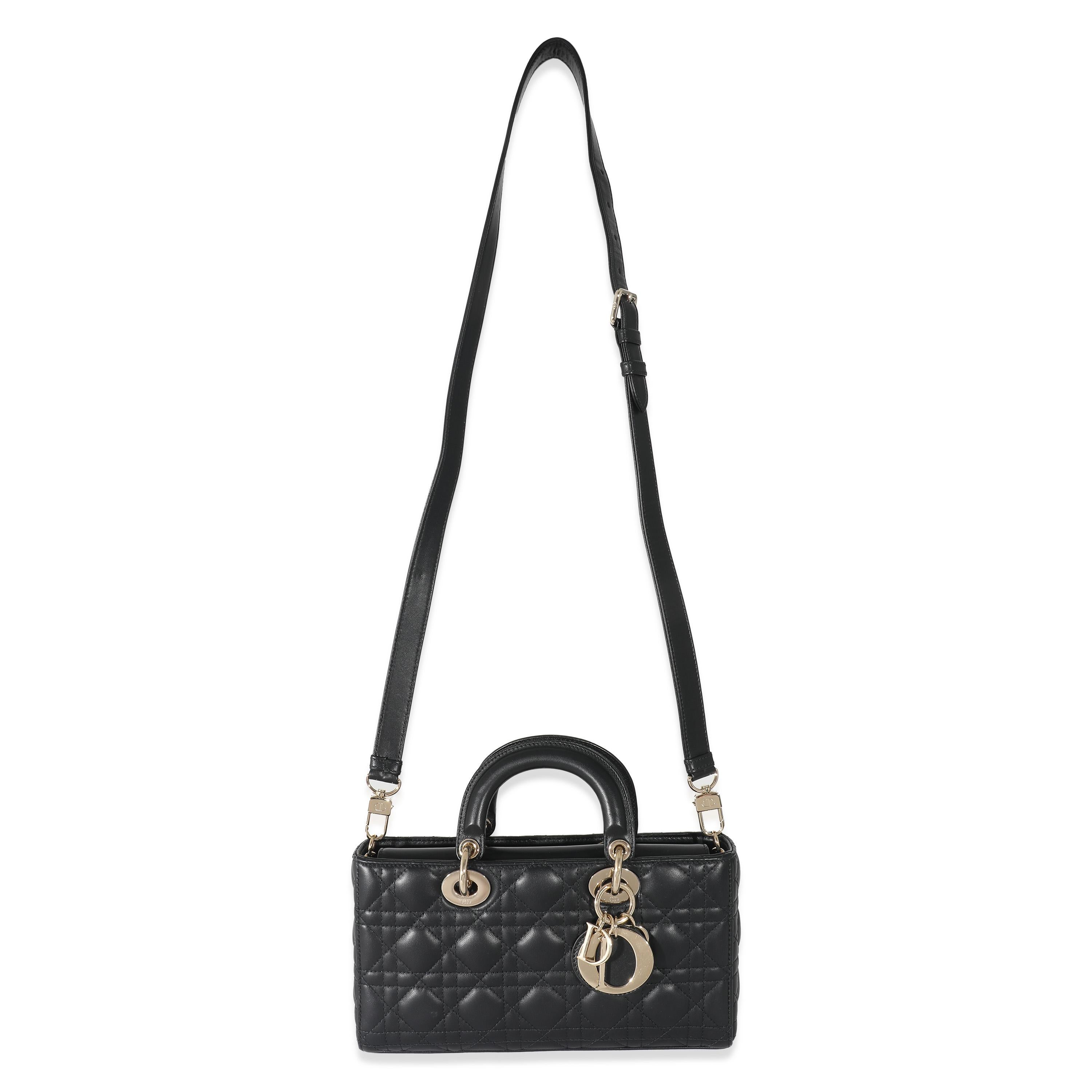 Listing Title: Christian Dior Black Cannage Lambskin Medium D-Joy Bag
SKU: 133011
MSRP: 5100.00 USD
Condition: Pre-owned 
Handbag Condition: Very Good
Condition Comments: Item is in very good condition with minor signs of wear. Exterior corner