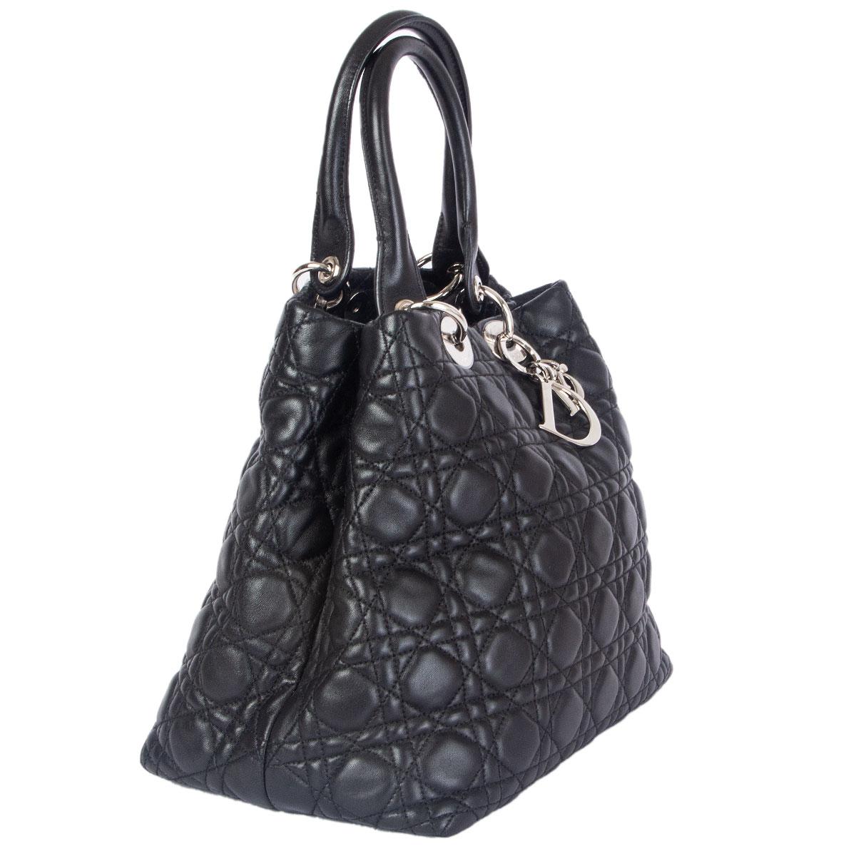 100% authentic Christian Dior 'Lady Dior Soft Medium' tote bag in black cannage lambskin. Opens with a magnetic button and hook on top and is lined in the classic Dior nylon with one zipper pocket against the back and one small open pocket against