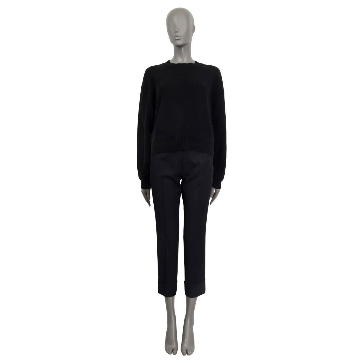 100% authentic Christian Dior 'J'Adore 8 Boxy' long sleeve sweater in black cashmere (100%). Features 'J'Adore Dior 8' in white letters with fringes on the back. Unlined. Has been worn and is in excellent condition.

Measurements
Tag