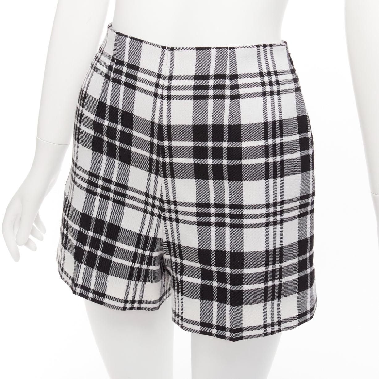 CHRISTIAN DIOR black checked virgin wool high waisted shorts FR32 XXS
Reference: AAWC/A00851
Brand: Dior
Designer: Maria Grazia Chiuri
Material: Virgin Wool
Color: Black, White
Pattern: Checkered
Closure: Zip
Lining: Black Fabric
Extra Details: Side