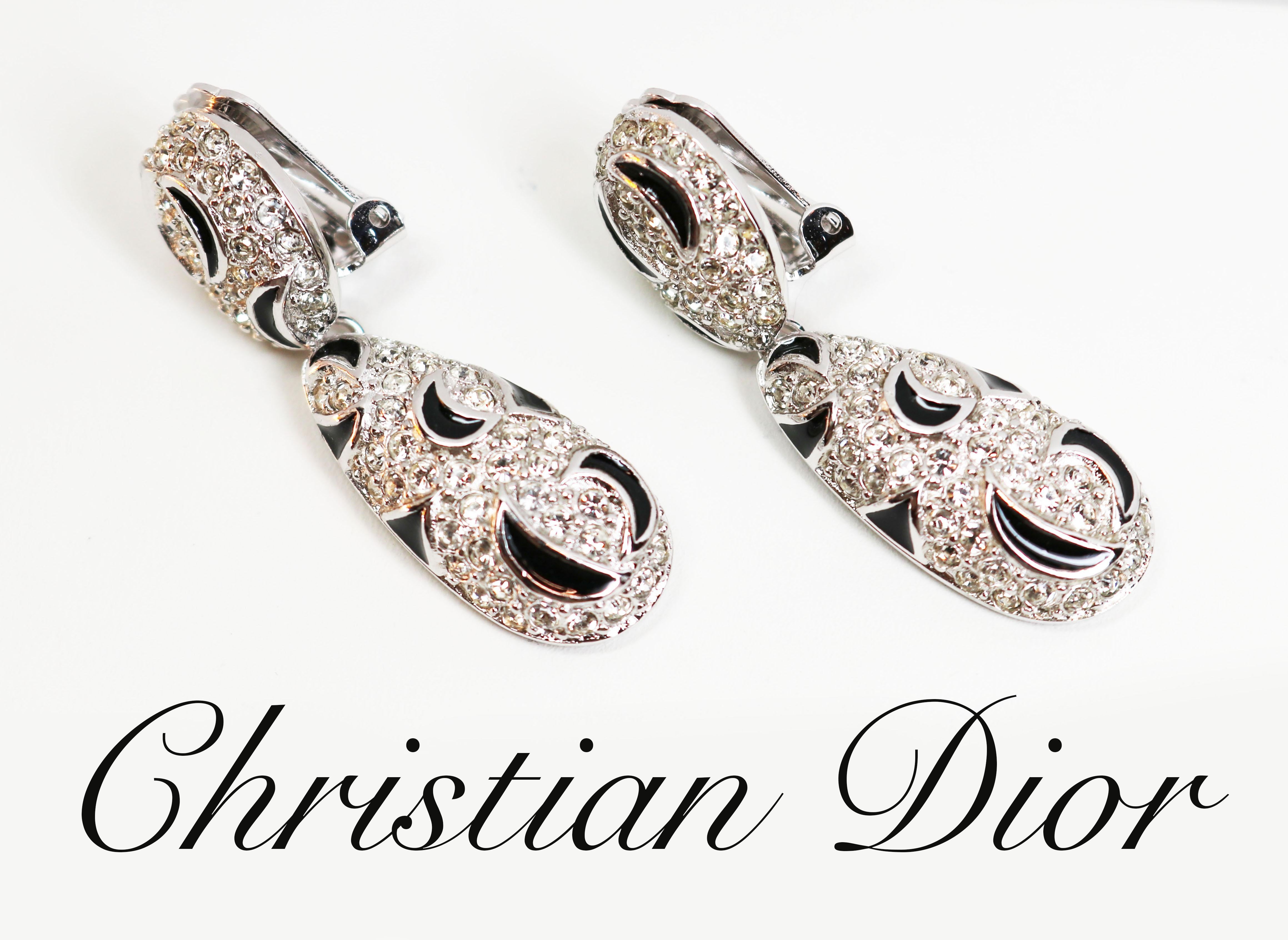 CHRISTIAN DIOR EARRINGS *signed* Authentic Crystal Encrusted Gold Plated Black Enamel Floral Clip On Dior Paris Designer Earrings New With Tags
These Dior designer earrings feature Austrian crystals encrusted in a black enamel highlighted flower