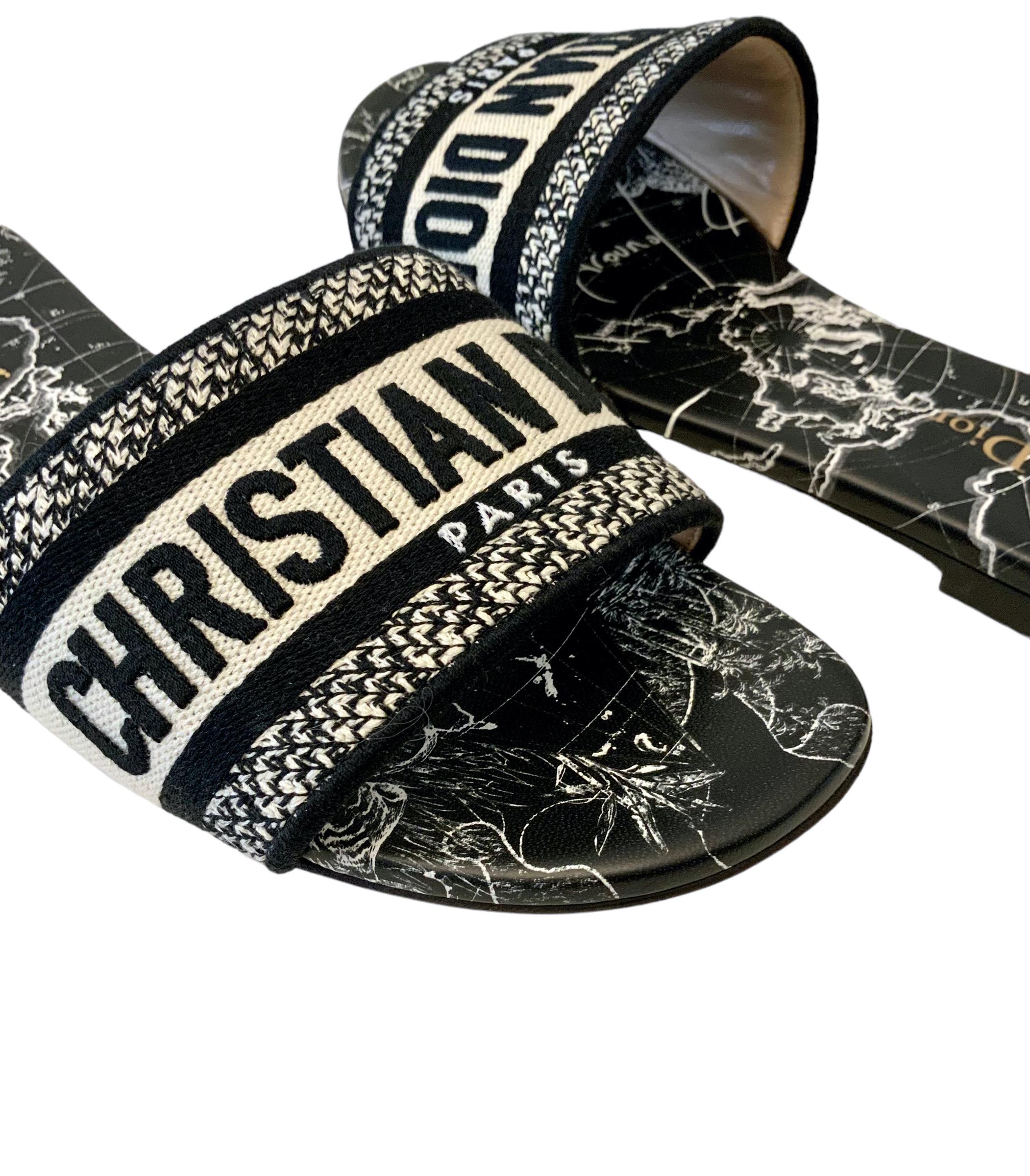 The Dway slide is an emblematic and timeless style featuring the Dior Around the World motif. 
The upper has a black embroidered 'CHRISTIAN DIOR' signature for an instantly recognizable design

Insole: Around the World print leather
Sole: engraved