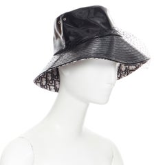 CHRISTIAN DIOR black faux leather net mesh trimmed monogram oblique bucket hat