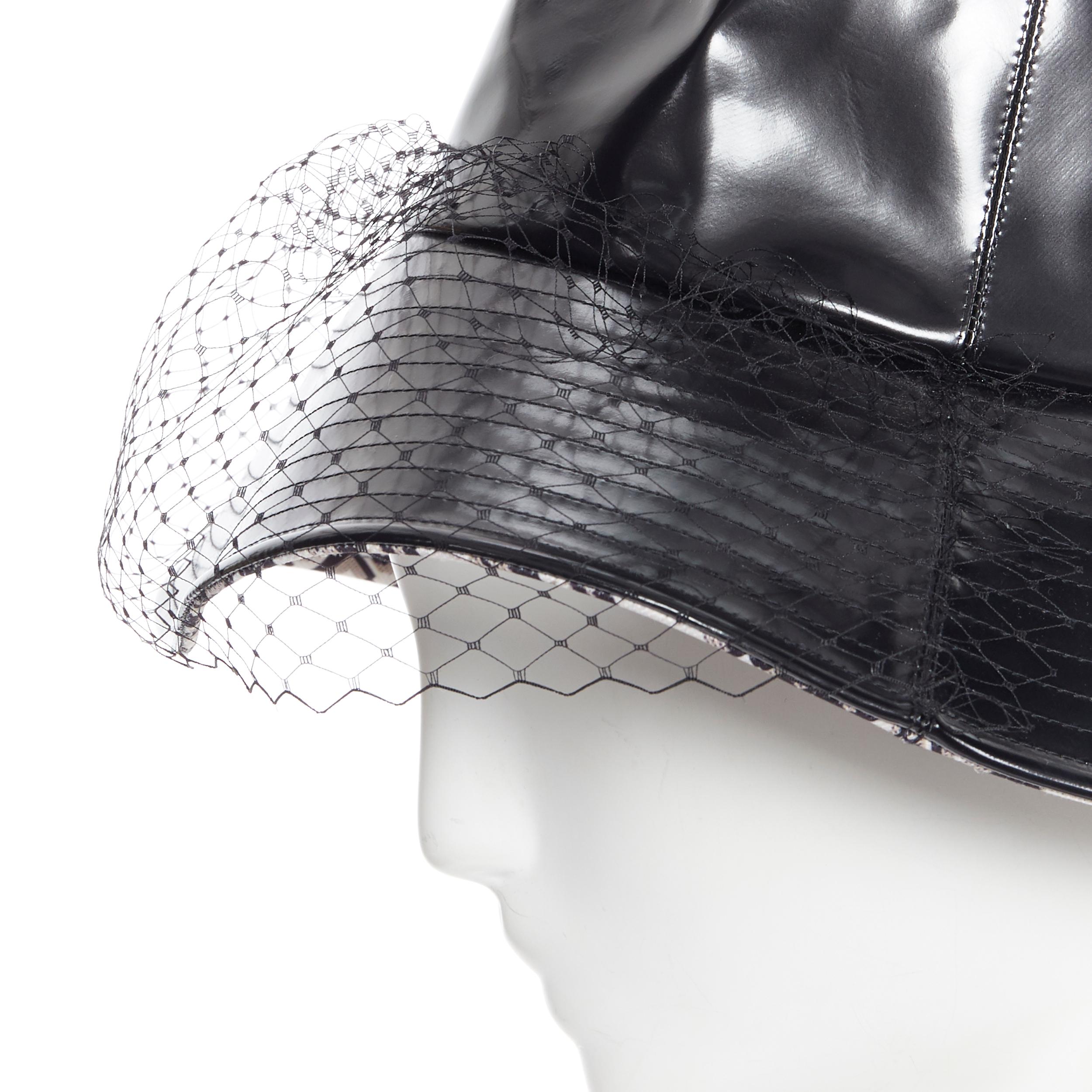 Black CHRISTIAN DIOR black faux leather net mesh trimmed monogram oblique bucket hat
